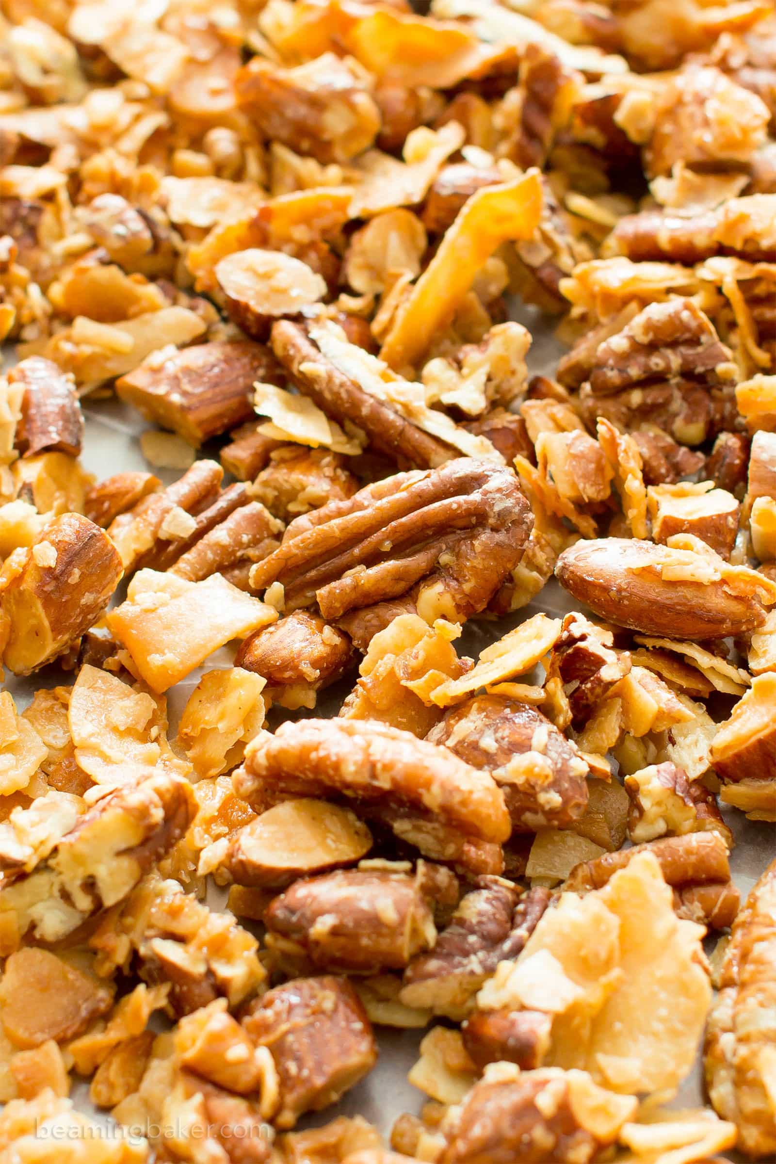 4 Ingredient Coconut Almond Pecan Paleo Granola (V, GF): a quick ‘n easy recipe for crunchy, salty & sweet granola packed with whole ingredients. #Paleo #Vegan #Snacks #Healthy #GlutenFree #DairyFree #RefinedSugarFree | BeamingBaker.com