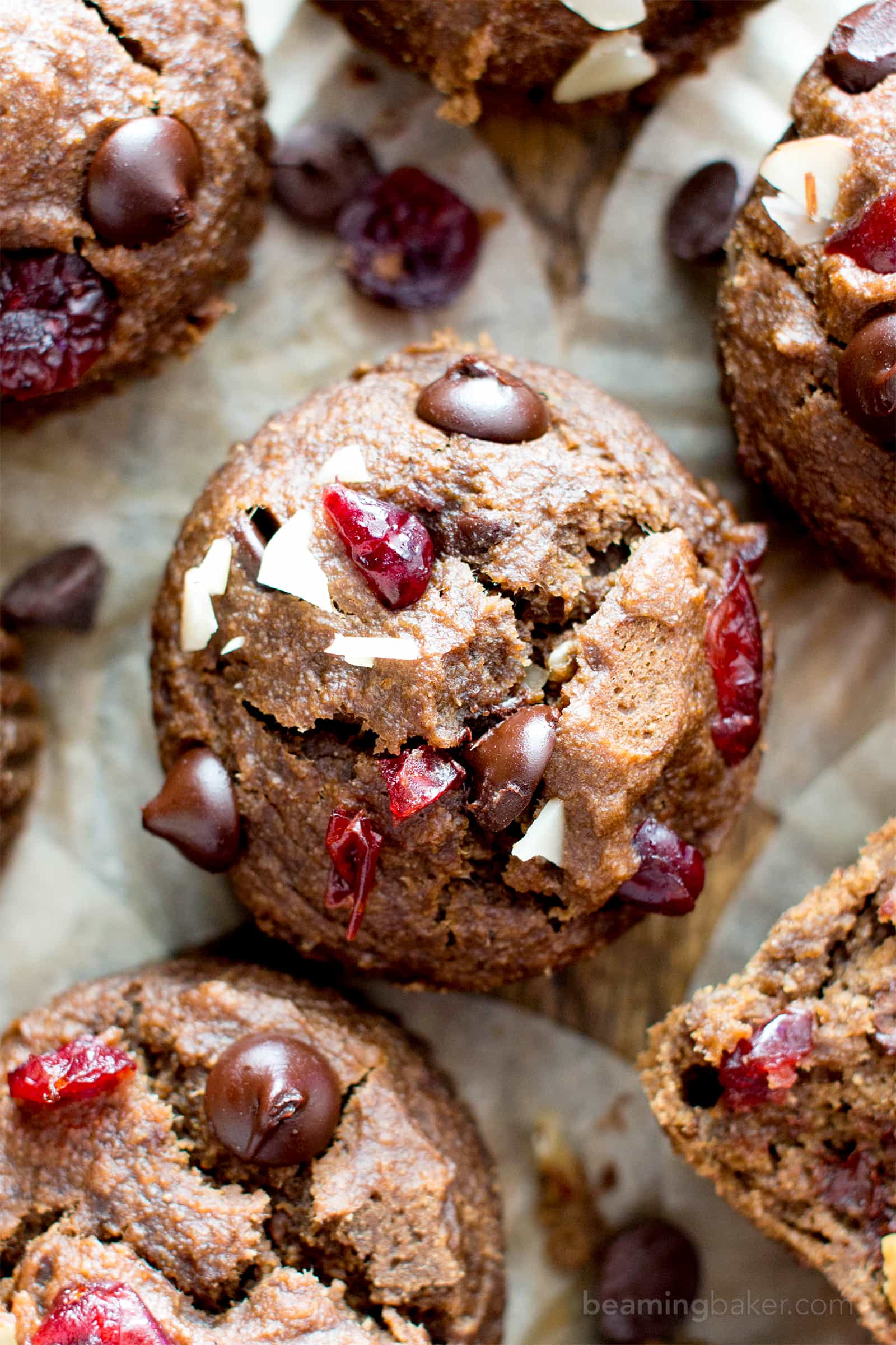 Chocolate Cranberry Almond Banana Muffins Recipe (V, GF): delightfully warm and cozy chocolate banana muffins packed with juicy cranberries and almonds. #Vegan #GlutenFree #DairyFree #Healthy #OneBowl | BeamingBaker.com
