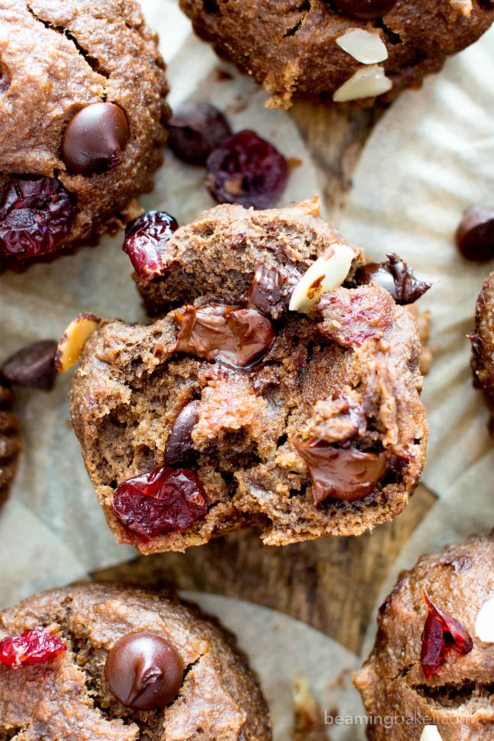 Chocolate Cranberry Almond Banana Muffins Recipe (V, GF): delightfully warm and cozy chocolate banana muffins packed with juicy cranberries and almonds. #Vegan #GlutenFree #DairyFree #Healthy #OneBowl | BeamingBaker.com