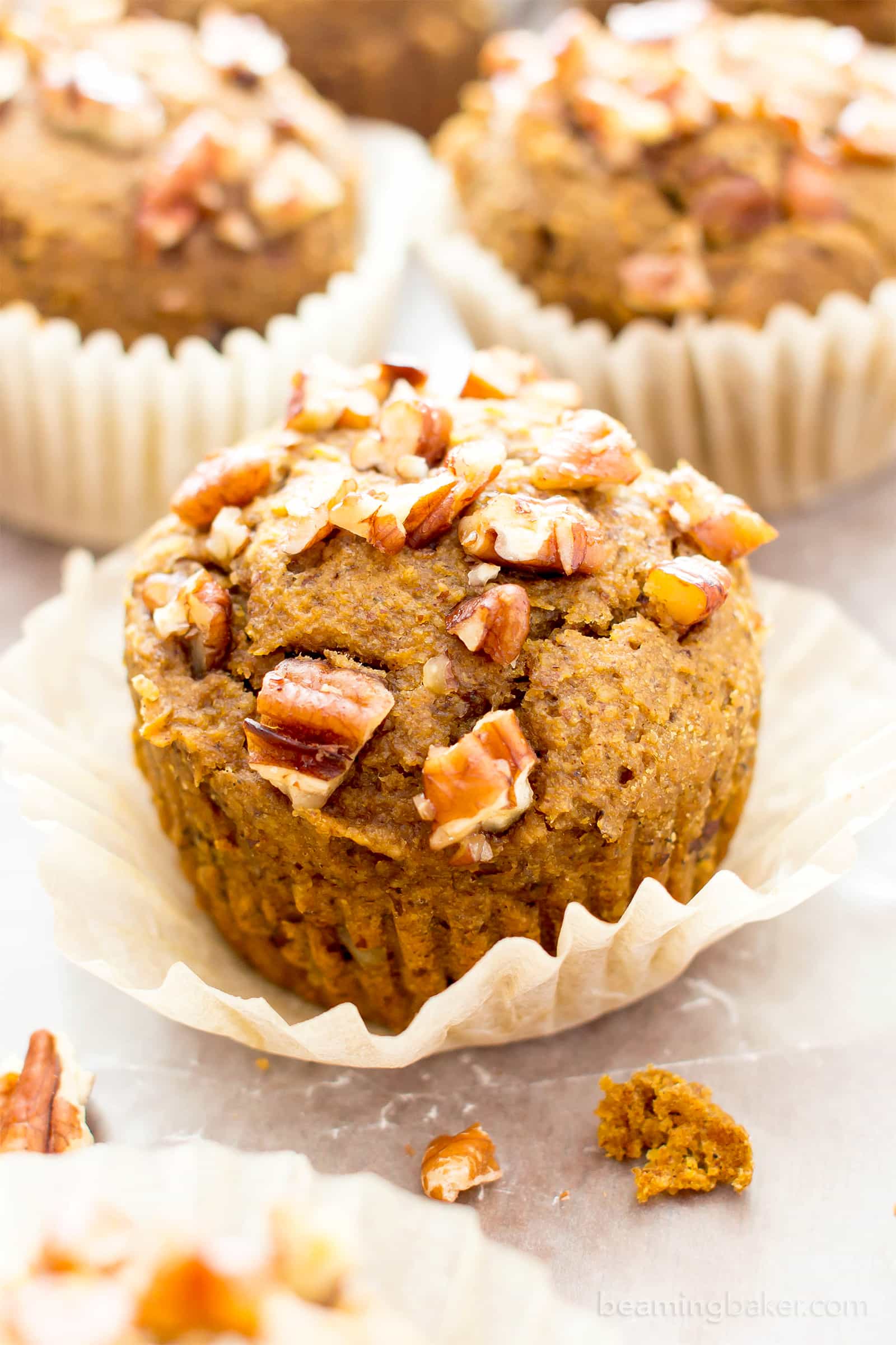 Gluten Free Maple Pecan Pumpkin Muffins (V, GF): an easy recipe for deliciously moist, pumpkin spice muffins topped with maple glazed pecans. #Vegan #GlutenFree #DairyFree #Healthy #Fall #RefinedSugarFree | BeamingBaker.com