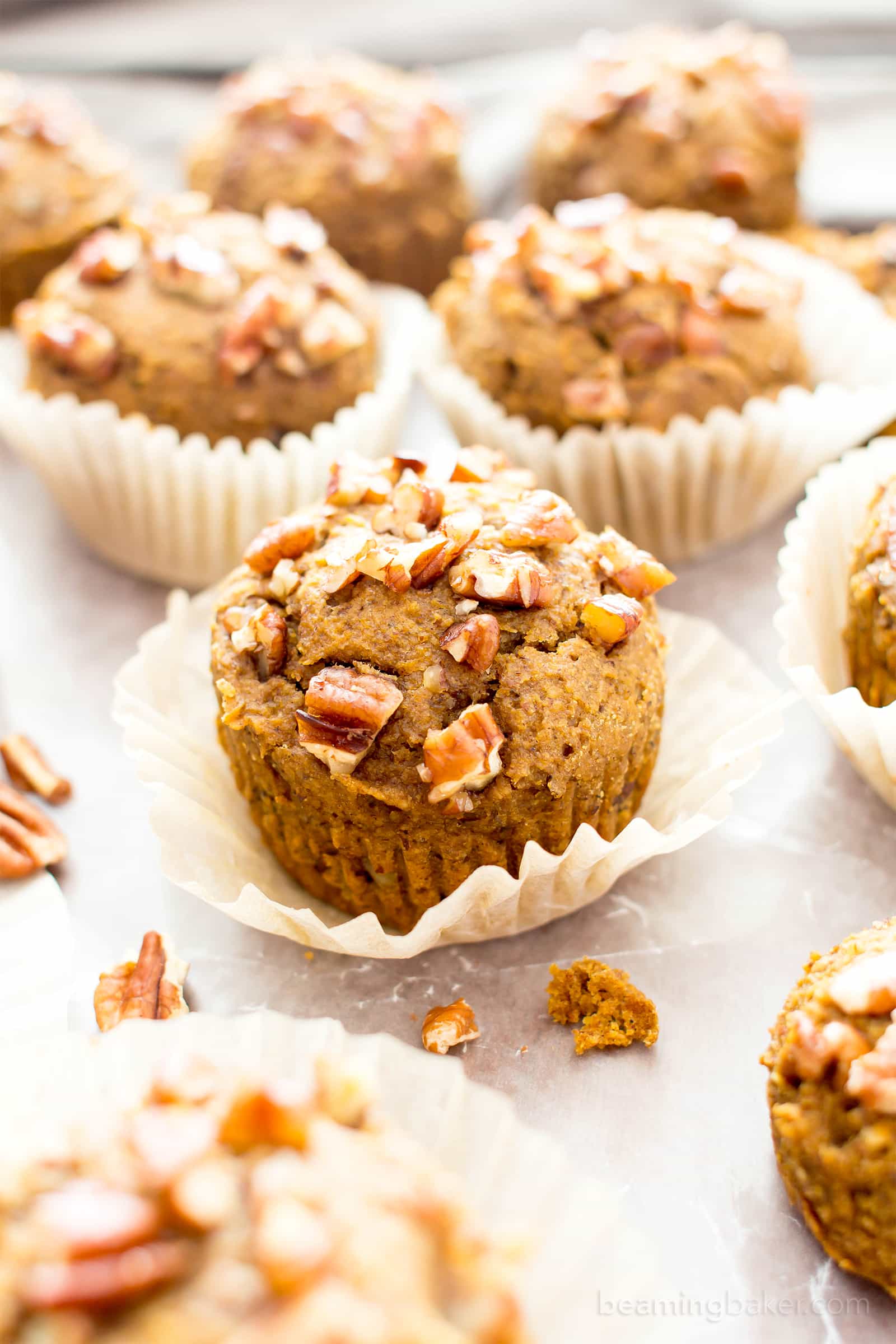 Gluten Free Maple Pecan Pumpkin Muffins (V, GF): an easy recipe for deliciously moist, pumpkin spice muffins topped with maple glazed pecans. #Vegan #GlutenFree #DairyFree #Healthy #Fall #RefinedSugarFree | BeamingBaker.com