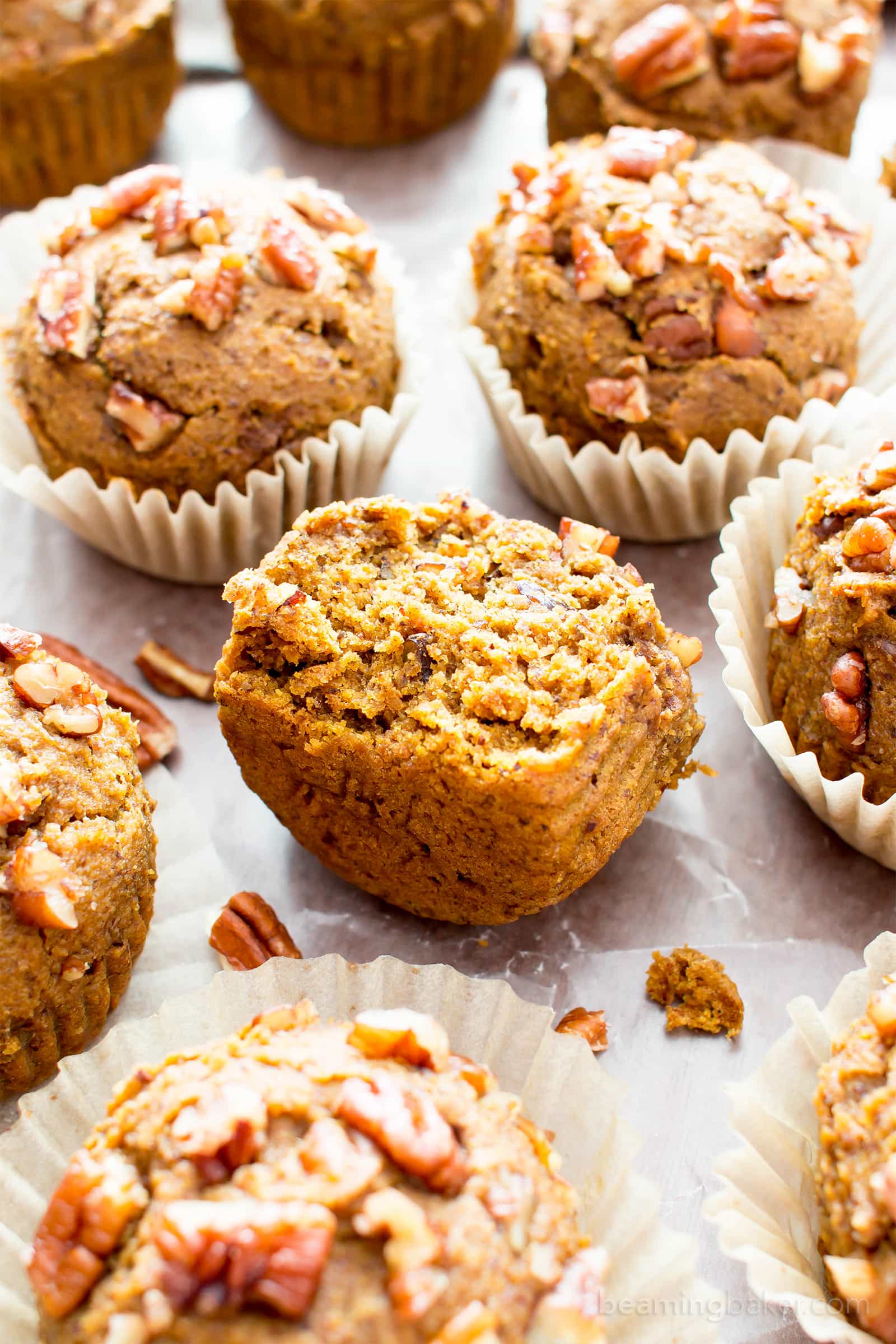 Gluten Free Maple Pecan Pumpkin Muffins (V, GF): an easy recipe for deliciously moist, pumpkin spice muffins topped with maple glazed pecans. #Vegan #GlutenFree #DairyFree #Healthy #Fall #RefinedSugarFree | BeamingBaker.com
