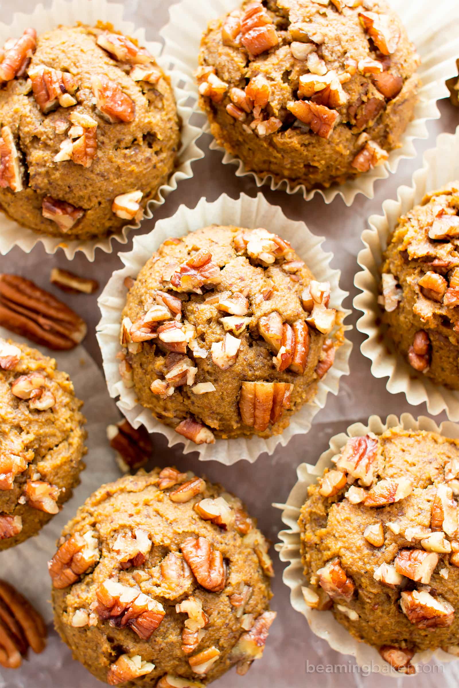 Gluten Free Maple Pecan Pumpkin Muffins (V, GF): an easy recipe for deliciously moist, pumpkin spice muffins topped with maple glazed pecans. #Vegan #GlutenFree #DairyFree #Healthy #Fall #RefinedSugarFree | BeamingBaker.com