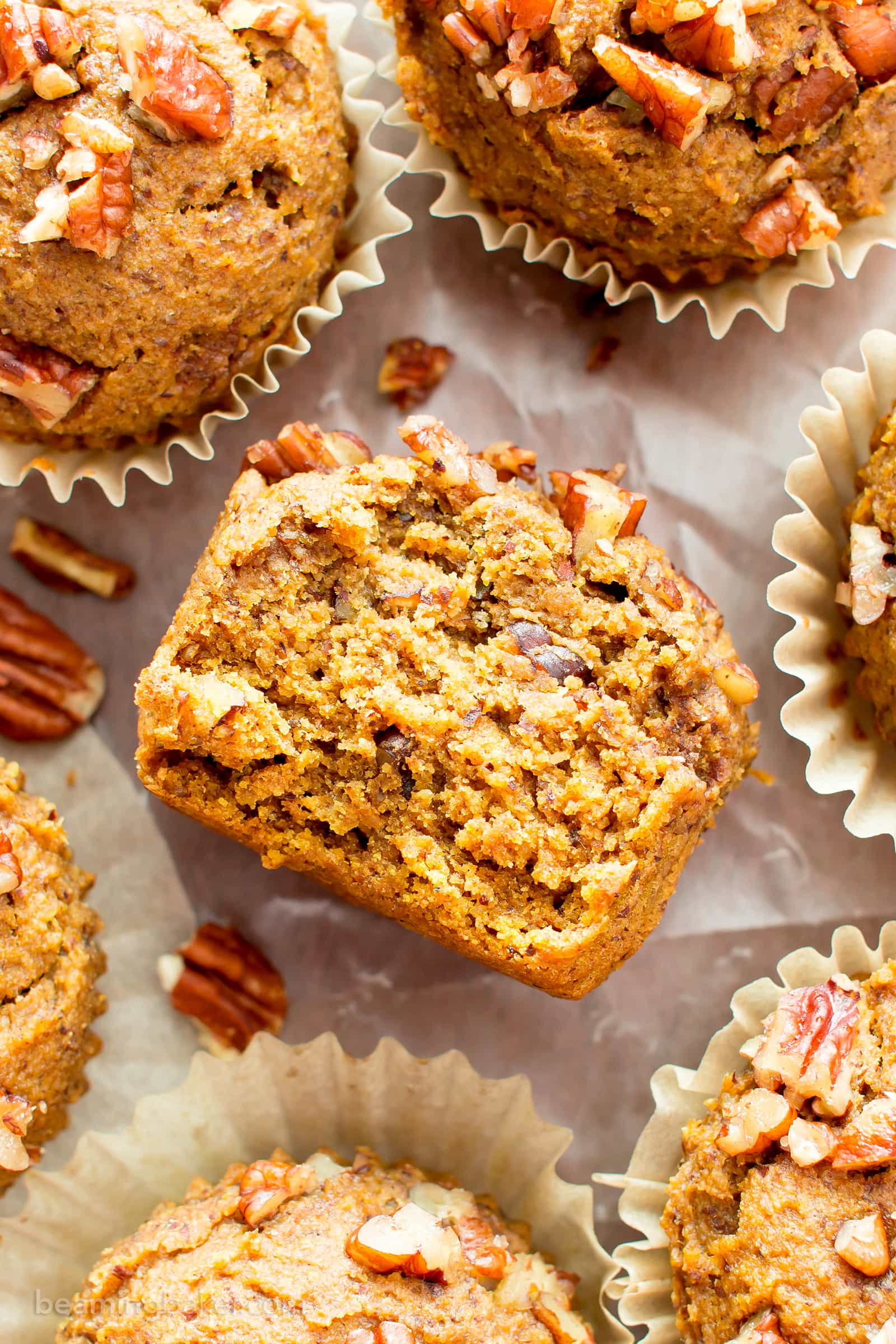 Gluten Free Maple Pecan Pumpkin Muffins (V, GF): an easy recipe for deliciously moist, pumpkin spice muffins topped with maple glazed pecans. #Vegan #GlutenFree #DairyFree #Healthy #Fall #RefinedSugarFree | BeamingBaker.com