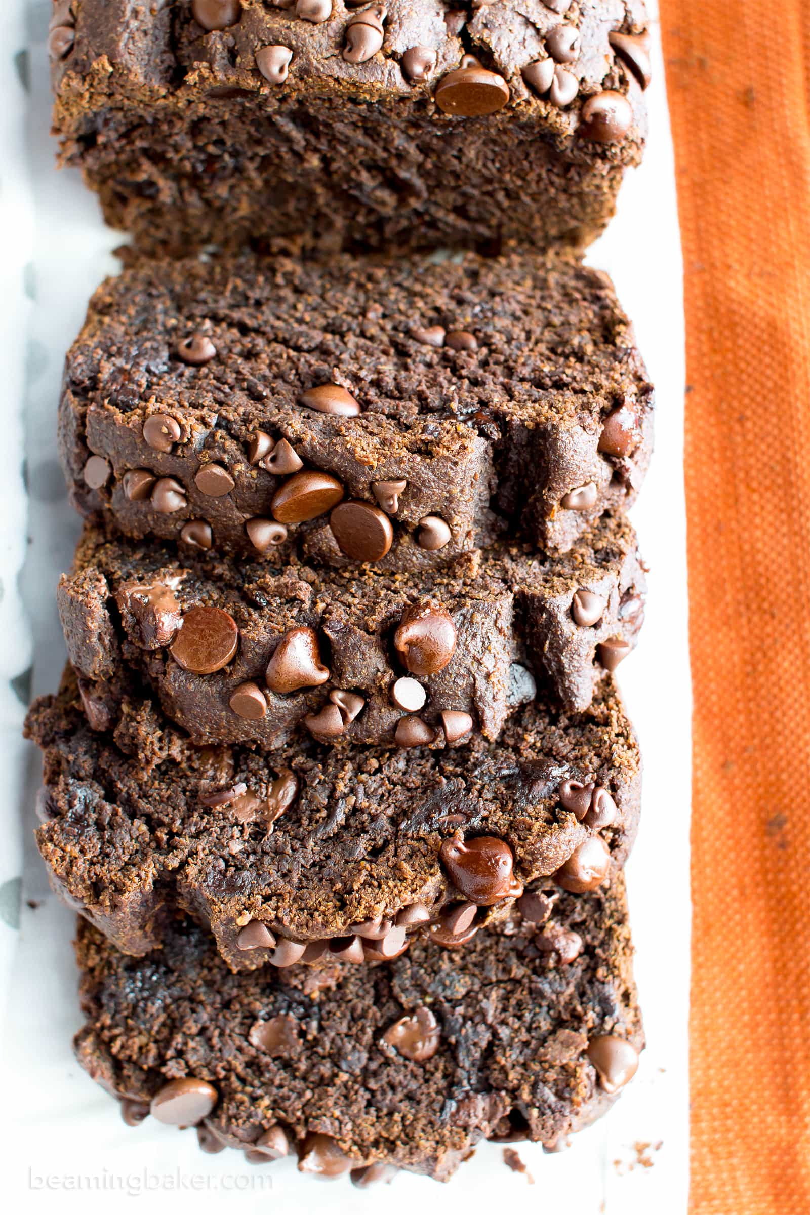 Gluten Free Vegan Chocolate Pumpkin Bread (V, GF): a one bowl recipe for perfectly moist ‘n decadent chocolate pumpkin bread made with warm spices and your favorite fall flavors. #GlutenFree #Vegan #DairyFree #RefinedSugarFree #Healthy #AllergyFriendly | BeamingBaker.com