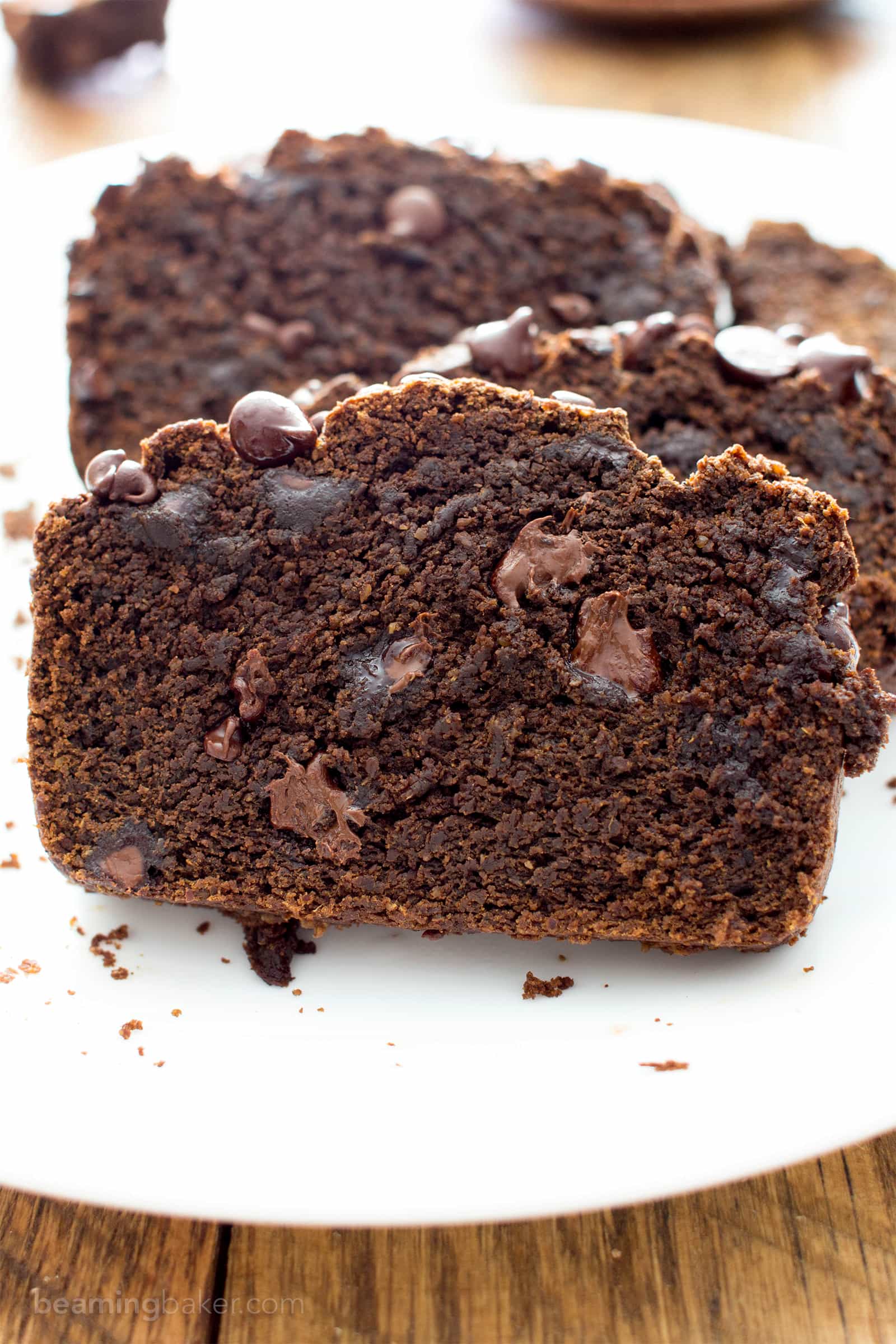 Gluten Free Vegan Chocolate Pumpkin Bread (V, GF): a one bowl recipe for perfectly moist ‘n decadent chocolate pumpkin bread made with warm spices and your favorite fall flavors. #GlutenFree #Vegan #DairyFree #RefinedSugarFree #Healthy #AllergyFriendly | BeamingBaker.com