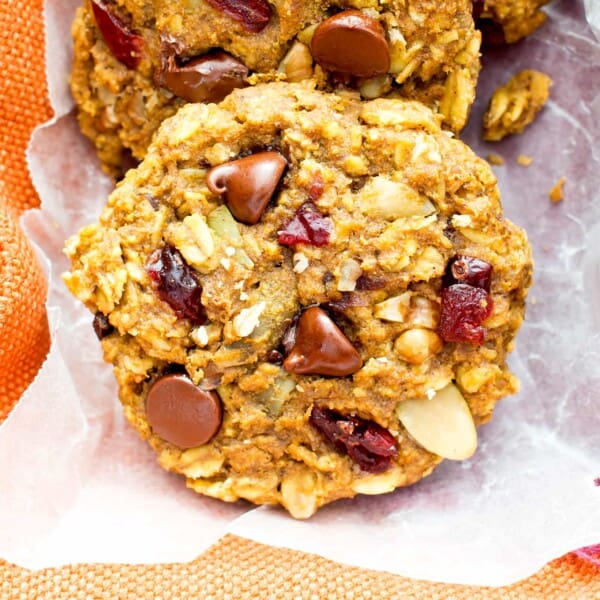 Pumpkin Chocolate Chip Oatmeal Breakfast Cookies (V, GF): Soft, chewy pumpkin oatmeal cookies packed with chocolate chips and pumpkin seeds. Perfect for breakfast or an afternoon treat! #Vegan #GlutenFree #DairyFree #Cookies #Baking #Breakfast | Recipe on BeamingBaker.com