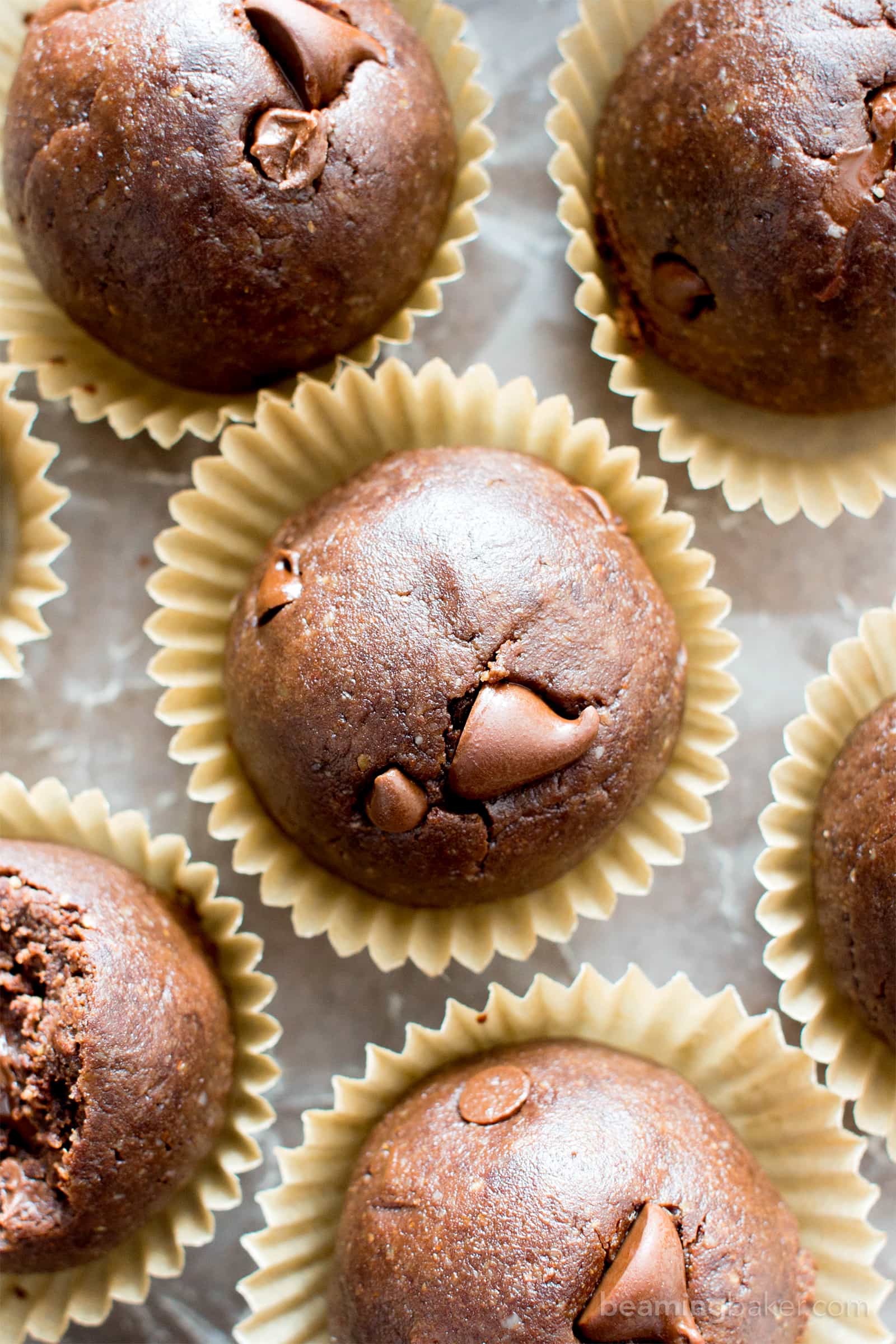 No Bake Almond Butter Paleo Brownie Bites (V, GF): Melt in your mouth fudgy paleo brownie bites that taste like a bite of pure chocolate. #Vegan #Paleo #DairyFree #GlutenFree #Chocolate | Recipe on BeamingBaker.com