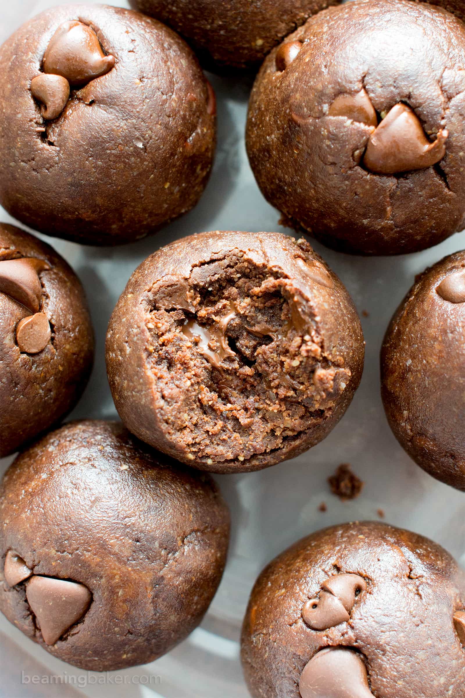 No Bake Almond Butter Paleo Brownie Bites (V, GF): Melt in your mouth fudgy paleo brownie bites that taste like a bite of pure chocolate. #Vegan #Paleo #DairyFree #GlutenFree #Chocolate | Recipe on BeamingBaker.com