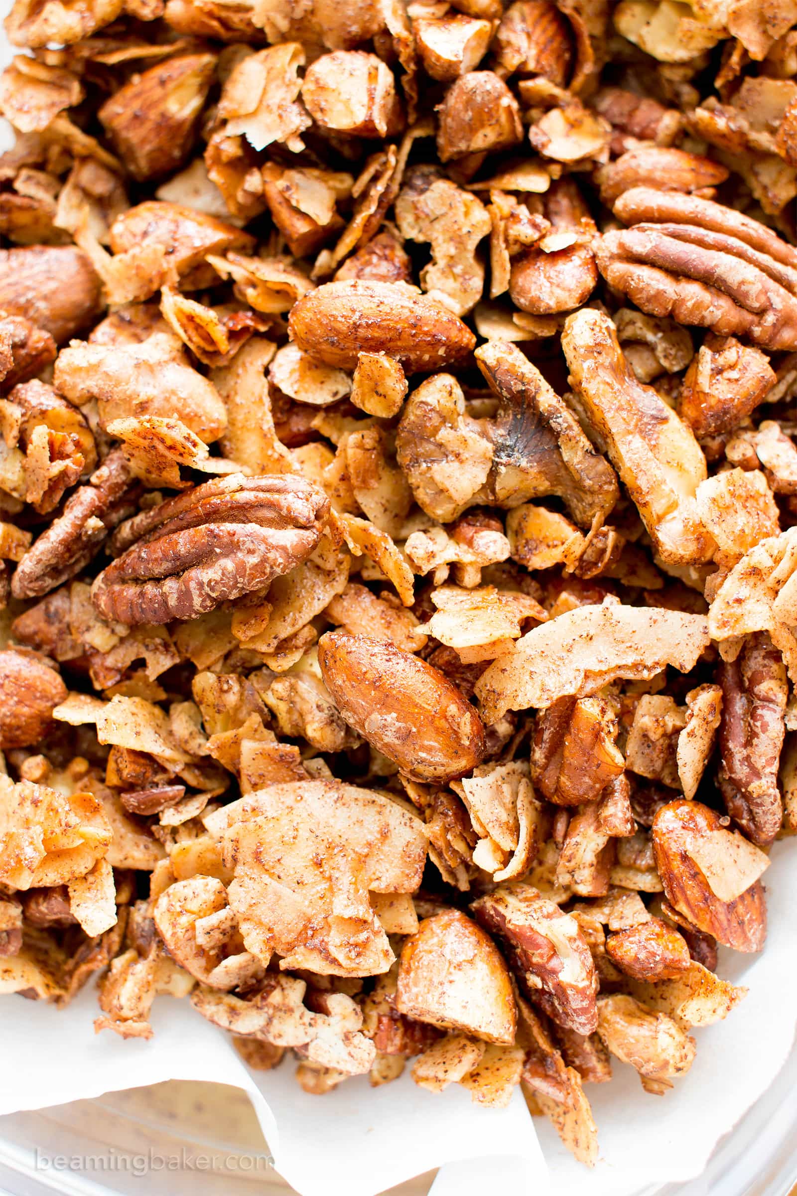 Oil-Free Paleo Cinnamon Nut Granola (V, GF): Crispy, crunchy homemade paleo granola perfectly spiced with warm, cozy cinnamon. #Vegan #GlutenFree #DairyFree #Paleo #Granola #Healthy #Snacks | Recipe on BeamingBaker.com