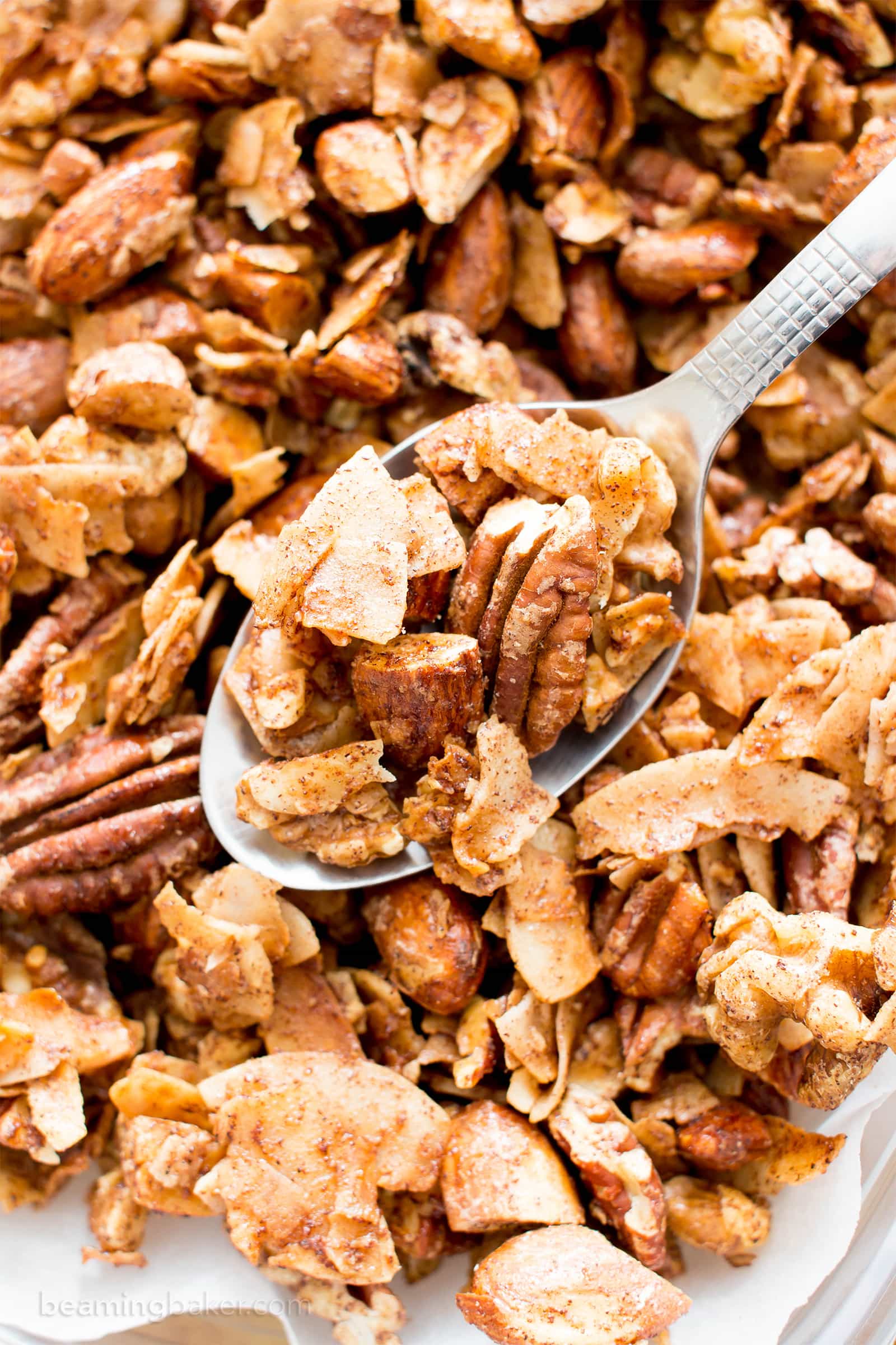 Oil-Free Paleo Cinnamon Nut Granola (V, GF): Crispy, crunchy homemade paleo granola perfectly spiced with warm, cozy cinnamon. #Vegan #GlutenFree #DairyFree #Paleo #Granola #Healthy #Snacks | Recipe on BeamingBaker.com