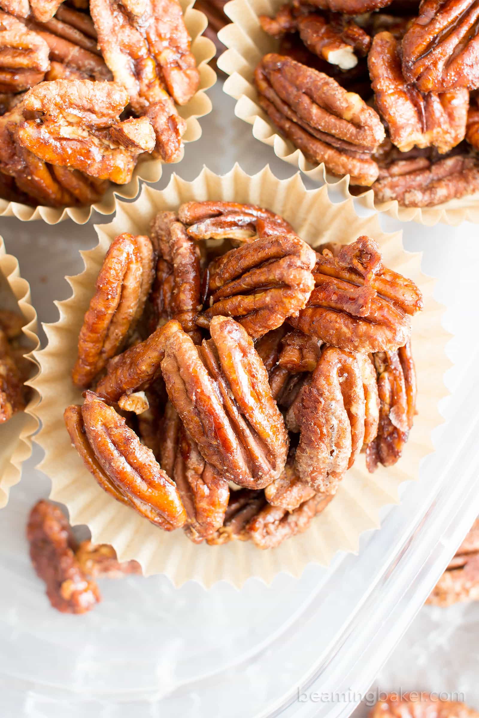 Vegan Candied Pecans: learn how to make candied pecans with just 4 healthy ingredients! Prep time is just 5 mins for deliciously glazed candied pecans in this lower sugar recipe! #Pecans #Healthy #Vegan #Fall | Recipe at BeamingBaker.com