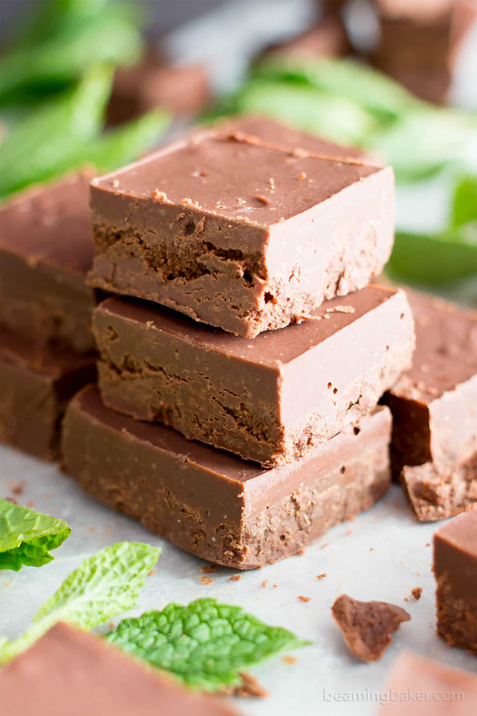 5 Minute Easy Peppermint Fudge (V, GF): a 3 ingredient recipe for creamy, thick indulgent chocolatey fudge squares made with healthy ingredients! #Paleo #Vegan #GlutenFree #DairyFree #HealthyHolidayDesserts | Recipe on BeamingBaker.com