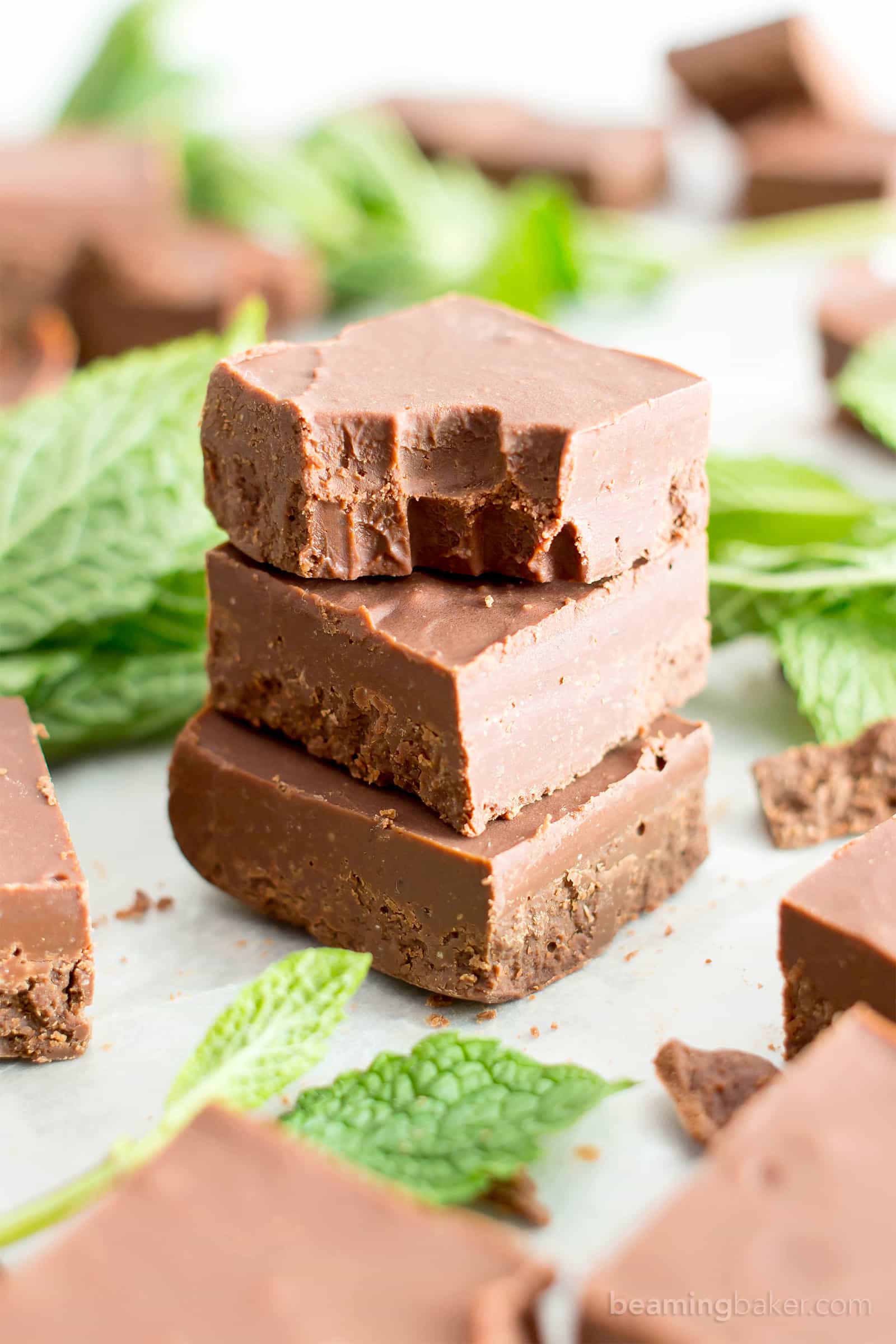 5 Minute Easy Peppermint Fudge (V, GF): a 3 ingredient recipe for creamy, thick indulgent chocolatey fudge squares made with healthy ingredients! #Paleo #Vegan #GlutenFree #DairyFree #HealthyHolidayDesserts | Recipe on BeamingBaker.com