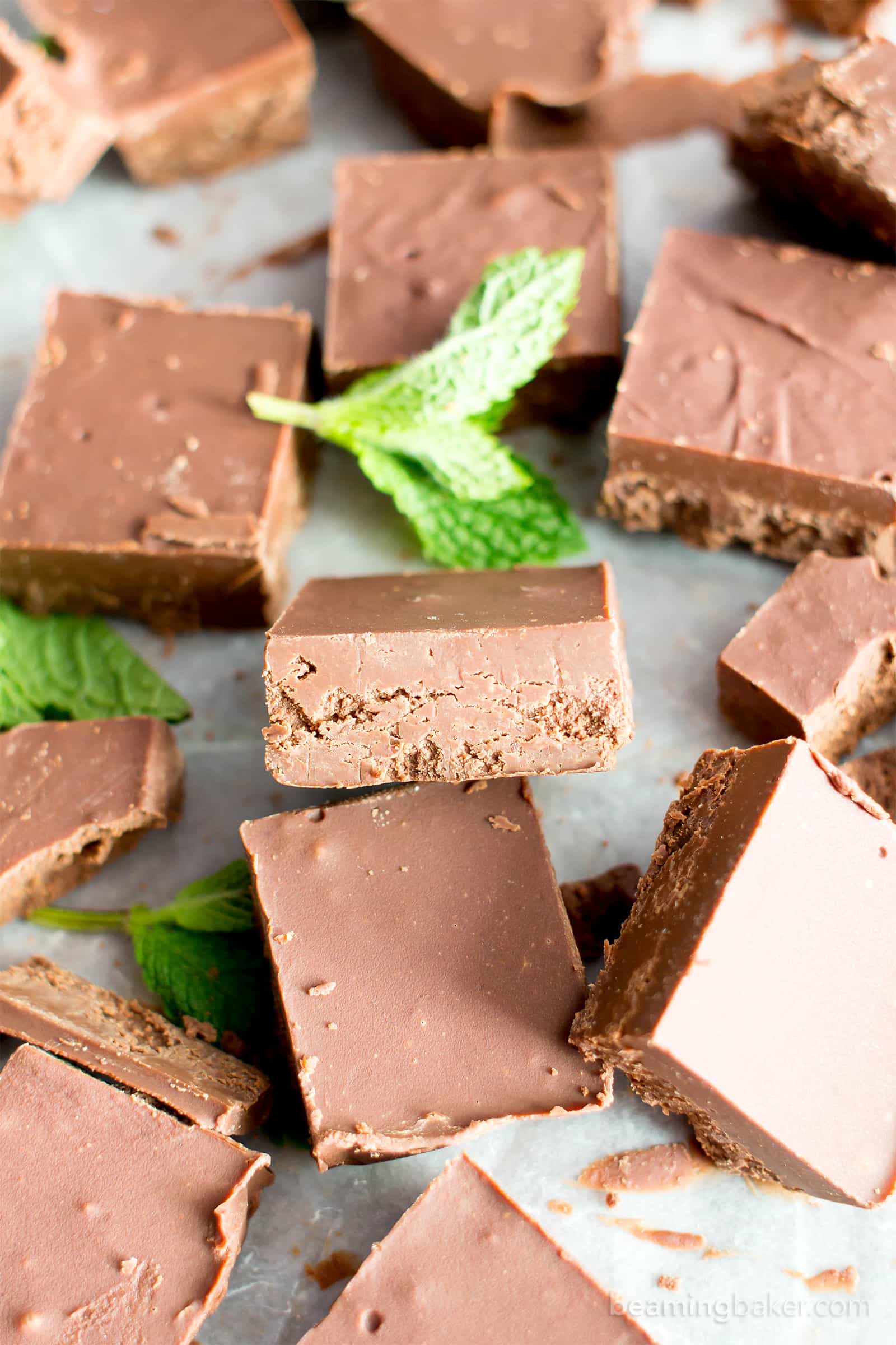 5 Minute Easy Peppermint Fudge (V, GF): a 3 ingredient recipe for creamy, thick indulgent chocolatey fudge squares made with healthy ingredients! #Paleo #Vegan #GlutenFree #DairyFree #HealthyHolidayDesserts | Recipe on BeamingBaker.com