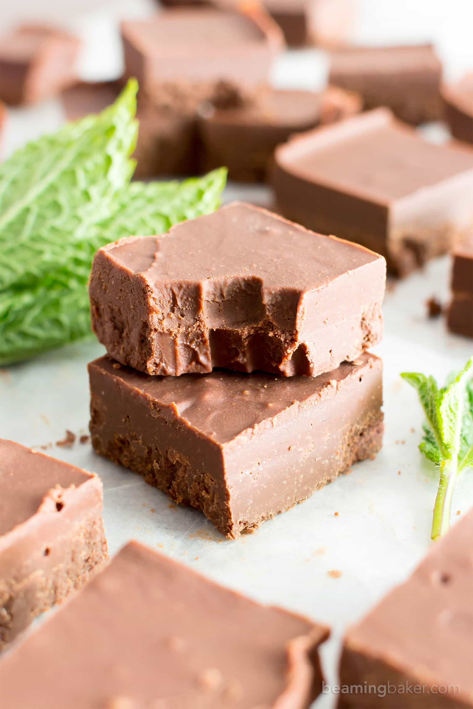 5 Minute Easy Peppermint Fudge (V, GF): a 3 ingredient recipe for creamy, thick indulgent chocolatey fudge squares made with healthy ingredients! #Paleo #Vegan #GlutenFree #DairyFree #HealthyHolidayDesserts | Recipe on BeamingBaker.com