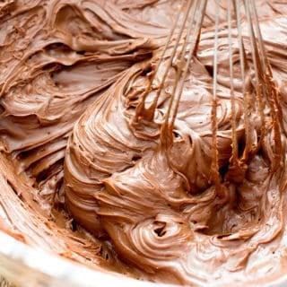How to Make Homemade Chocolate Frosting Recipe (V, GF): learn how to make easy vegan chocolate frosting that’s smooth, silky and chocolatey. Whipped frosting doesn't require refrigeration! #Vegan #Paleo #HealthyDesserts #DairyFree #GlutenFree | Recipe on BeamingBaker.com