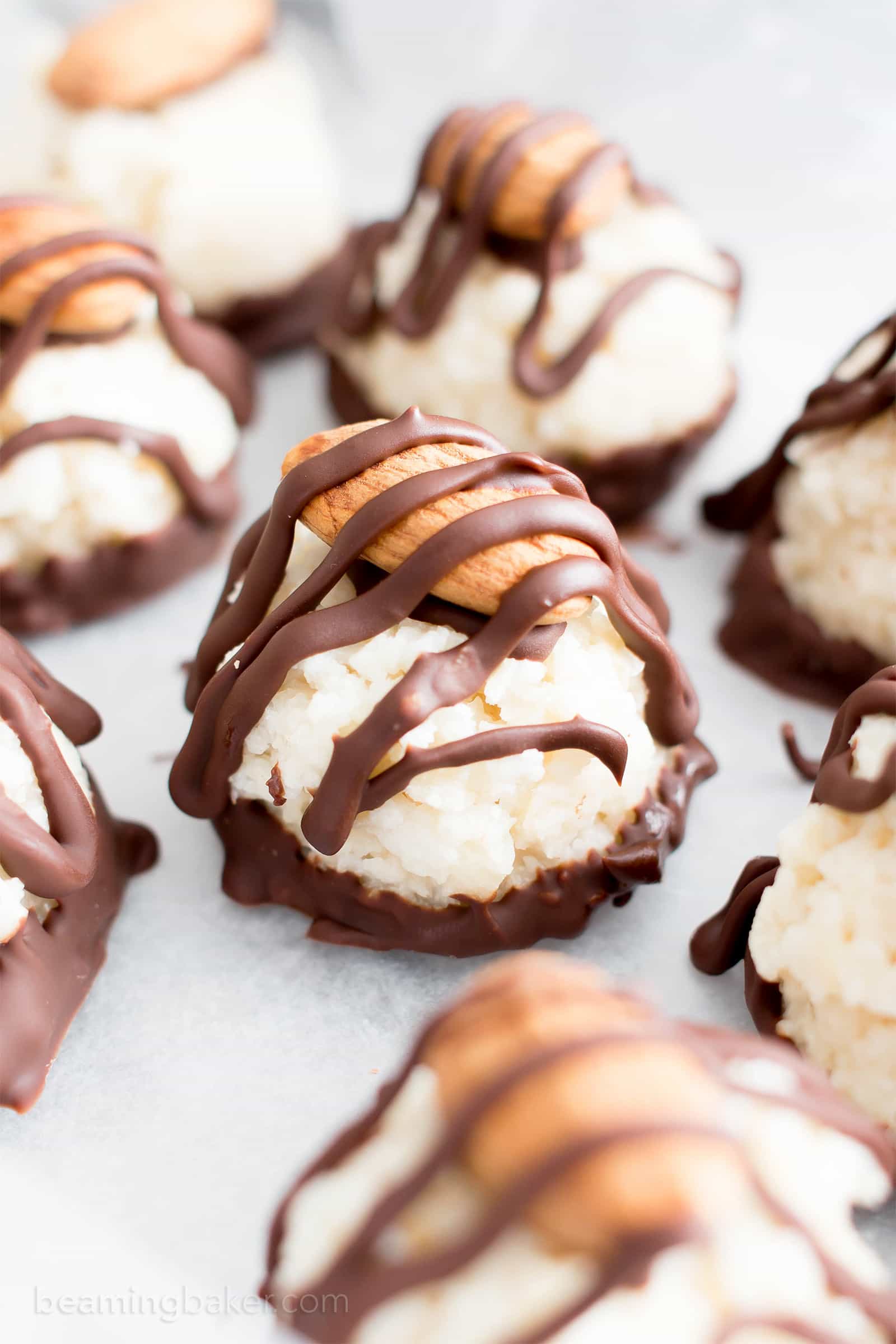 Paleo Vegan Almond Joy Truffles (V, GF): a fun recipe for homemade candy truffles that taste just like Almond Joy! #Vegan #GlutenFree #Paleo #Candy #Dessert | Recipe on BeamingBaker.com