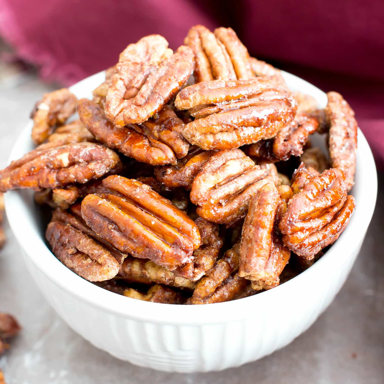 Vegan Candied Pecans: learn how to make candied pecans with just 4 healthy ingredients! Prep time is just 5 mins for deliciously glazed candied pecans in this lower sugar recipe! #Pecans #Healthy #Vegan #Fall | Recipe at BeamingBaker.com