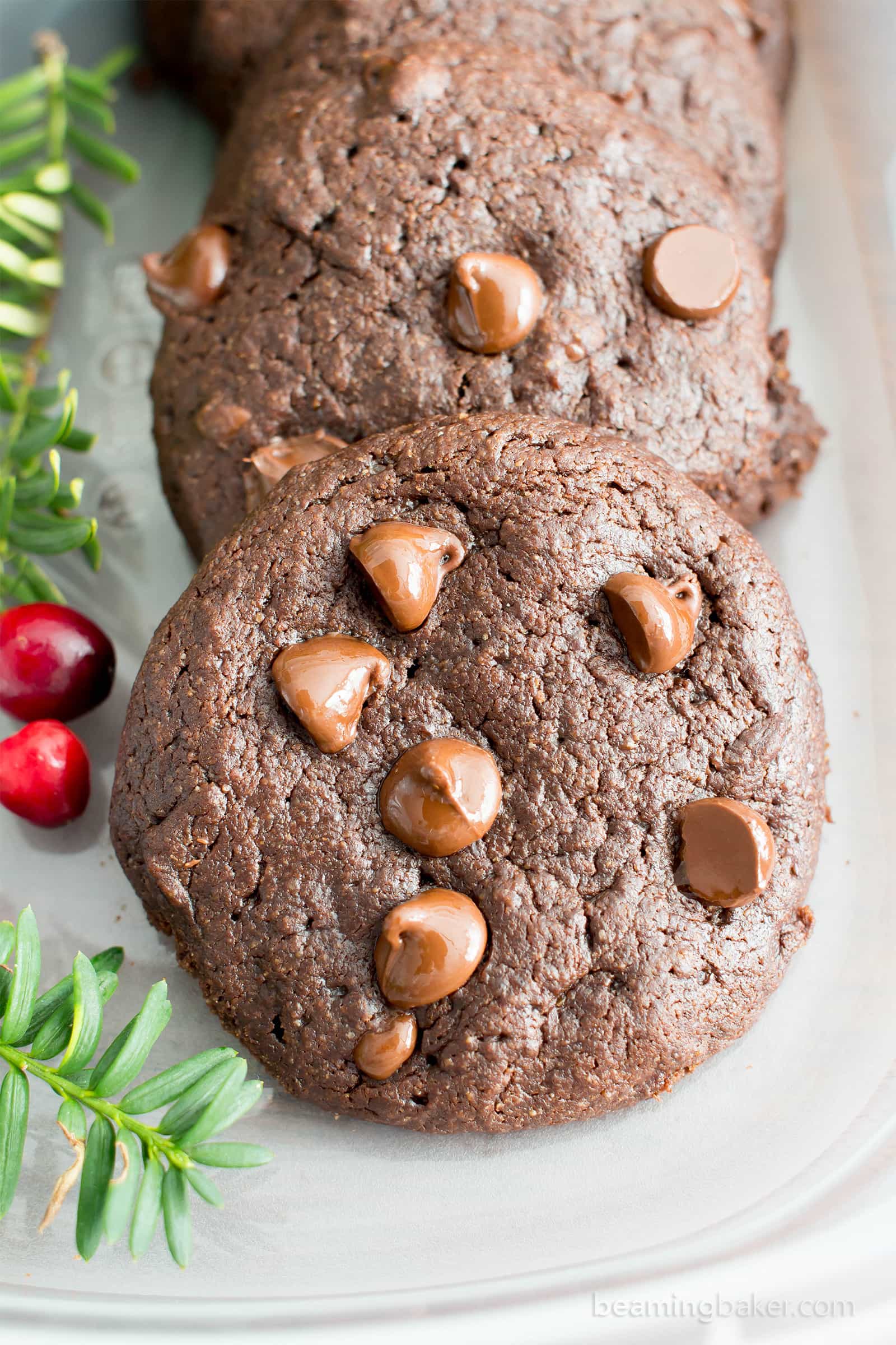 Gluten Free Peppermint Brownie Cookies Recipe (V, GF): a one bowl recipe for soft, decadent and fudgy brownie cookies (aka brookies) bursting with cool peppermint flavor and melted chocolate chips. #Vegan #GlutenFree #DairyFree #HealthyDessert #Holiday #Christmas | Recipe on BeamingBaker.com