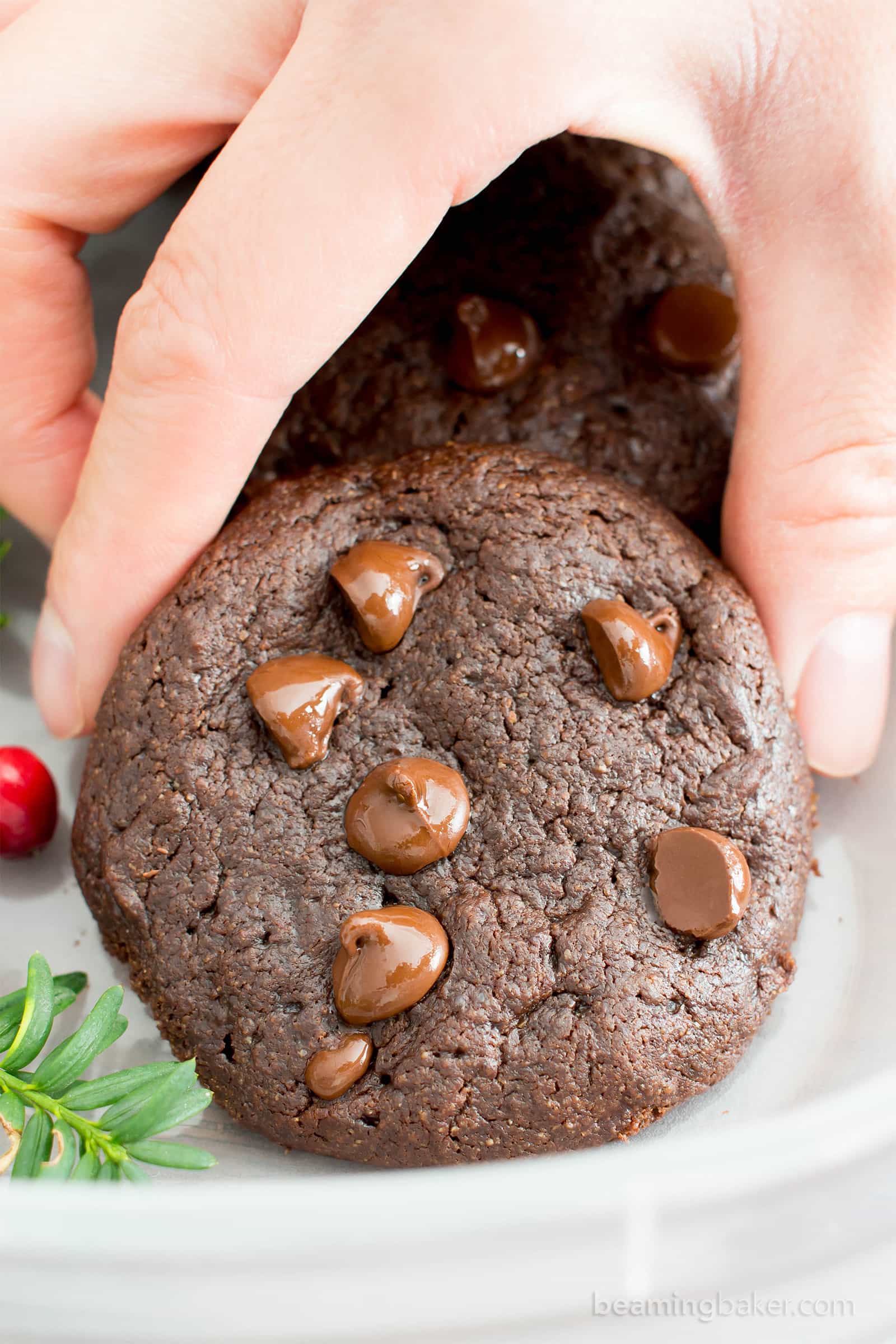Gluten Free Peppermint Brownie Cookies Recipe (V, GF): a one bowl recipe for soft, decadent and fudgy brownie cookies (aka brookies) bursting with cool peppermint flavor and melted chocolate chips. #Vegan #GlutenFree #DairyFree #HealthyDessert #Holiday #Christmas | Recipe on BeamingBaker.com