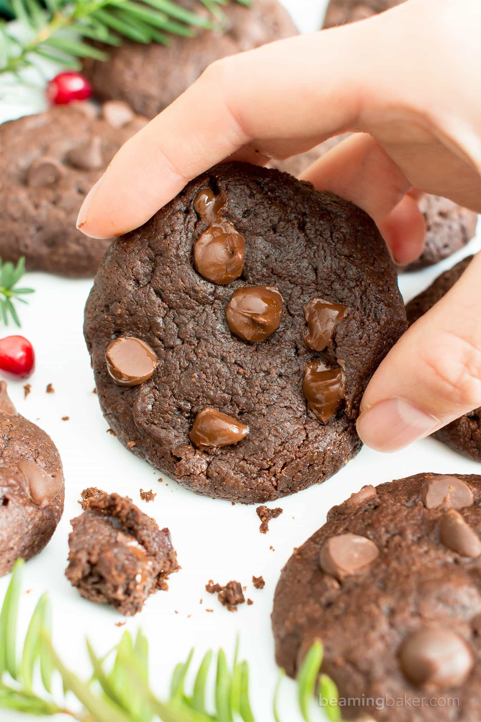 Gluten Free Peppermint Brownie Cookies Recipe (V, GF): a one bowl recipe for soft, decadent and fudgy brownie cookies (aka brookies) bursting with cool peppermint flavor and melted chocolate chips. #Vegan #GlutenFree #DairyFree #HealthyDessert #Holiday #Christmas | Recipe on BeamingBaker.com