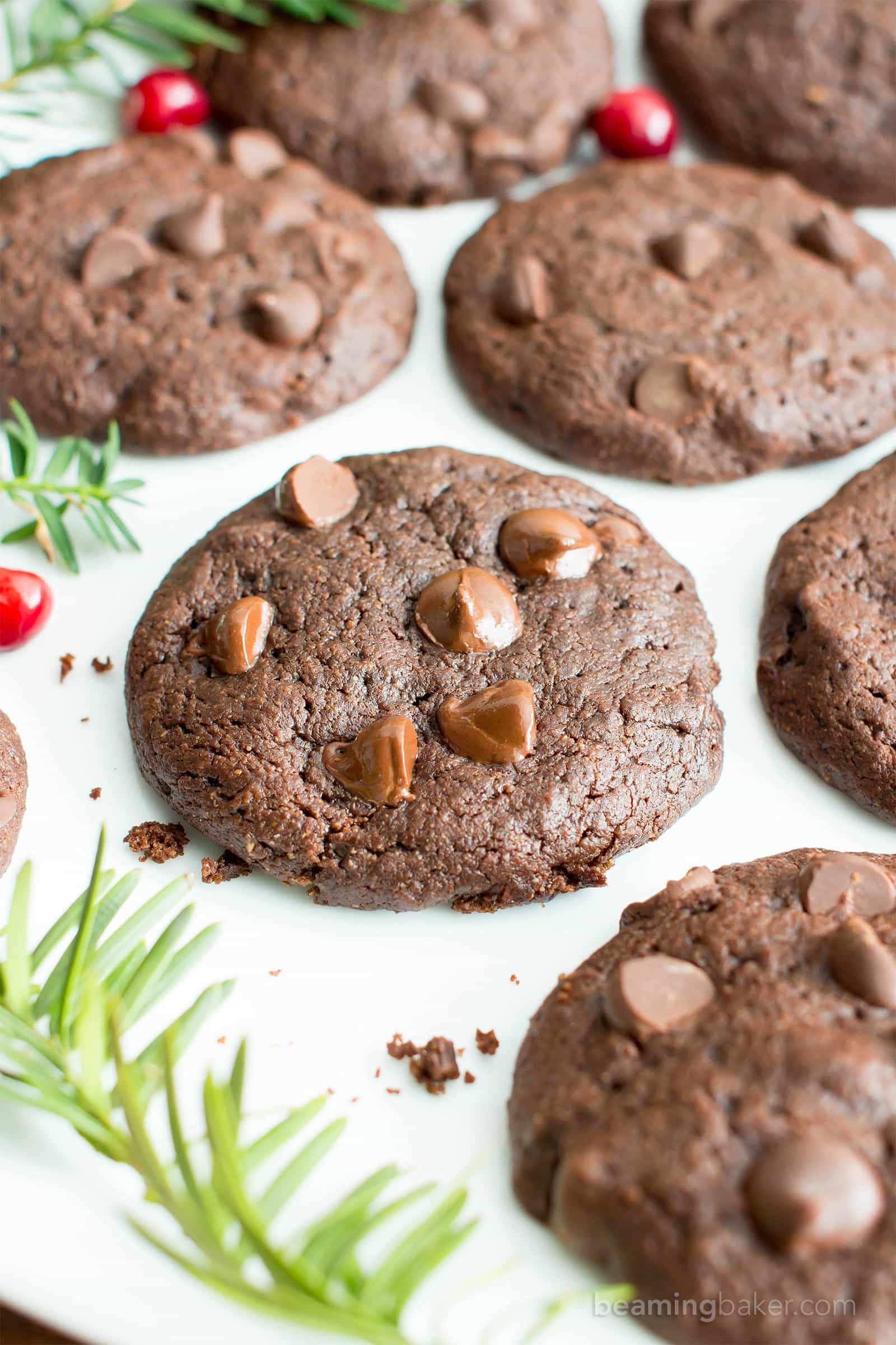 Gluten Free Peppermint Brownie Cookies Recipe (V, GF): a one bowl recipe for soft, decadent and fudgy brownie cookies (aka brookies) bursting with cool peppermint flavor and melted chocolate chips. #Vegan #GlutenFree #DairyFree #HealthyDessert #Holiday #Christmas | Recipe on BeamingBaker.com