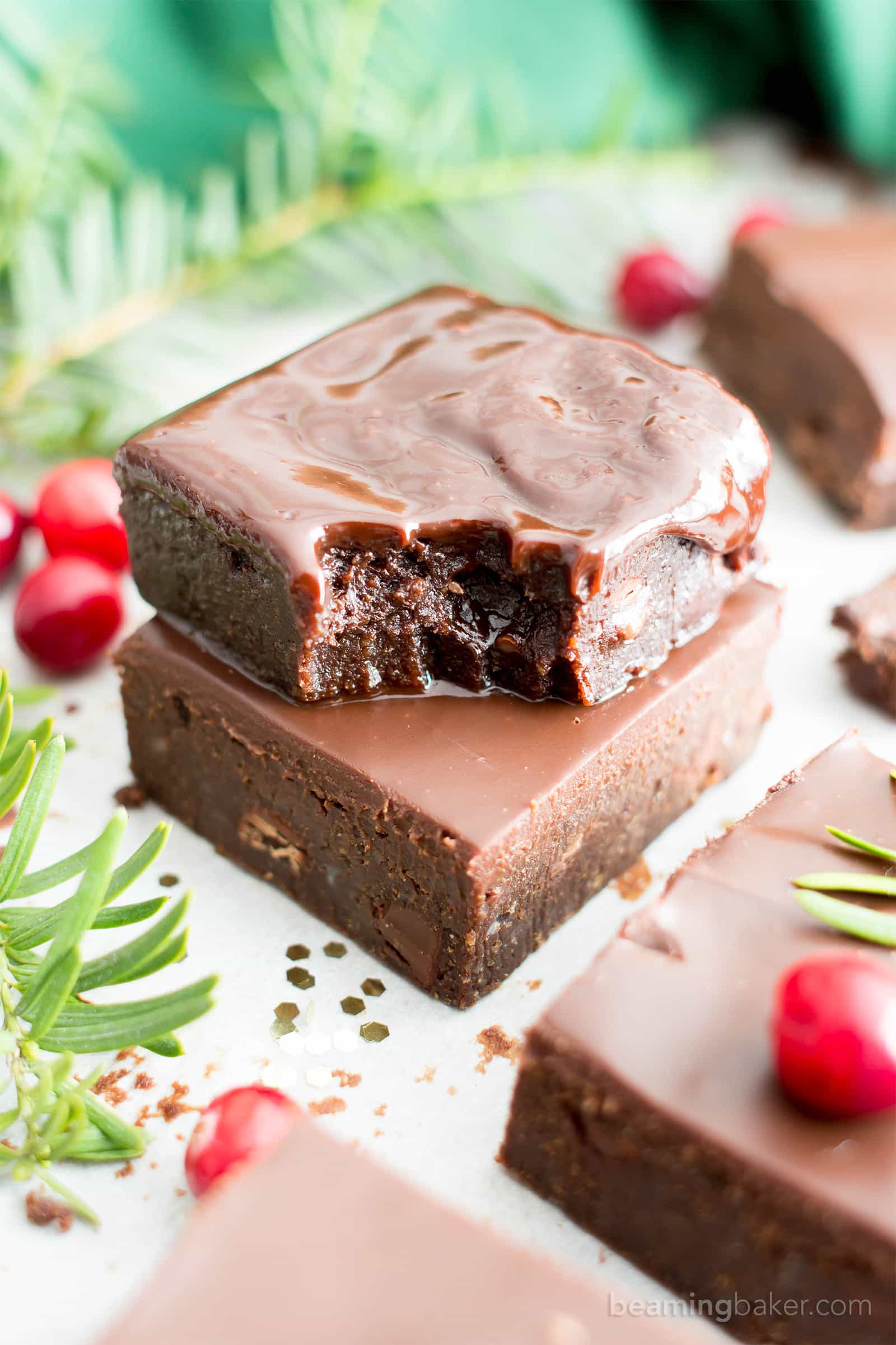 Moist & Fudgy Ganache Peppermint Brownies Recipe (V, GF): an easy recipe for indulgently fudgy, cool mint brownies topped with silky smooth chocolate ganache made with healthy ingredients. #Vegan #GlutenFree #DairyFree #HealthyHolidayDesserts #Desserts | Recipe on BeamingBaker.com