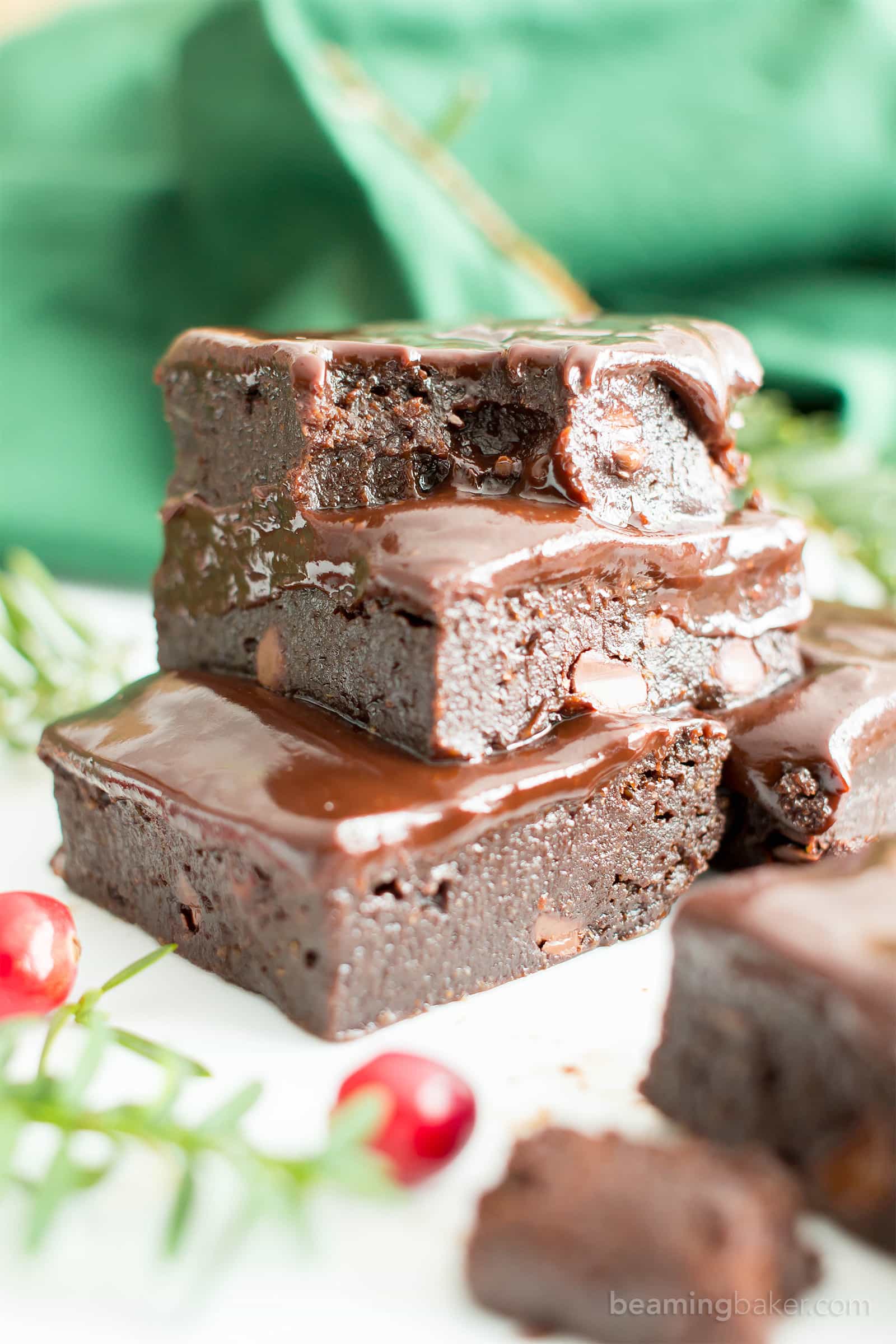 Moist & Fudgy Ganache Peppermint Brownies Recipe (V, GF): an easy recipe for indulgently fudgy, cool mint brownies topped with silky smooth chocolate ganache made with healthy ingredients. #Vegan #GlutenFree #DairyFree #HealthyHolidayDesserts #Desserts | Recipe on BeamingBaker.com