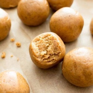 3 Ingredient No Bake Almond Butter Paleo Energy Balls (V, GF, DF): an easy recipe for perfectly sweet, seriously satisfying no bake paleo energy bites. #Vegan #Paleo #GlutenFree #DairyFree #Healthy #Snacks | Recipe on BeamingBaker.com