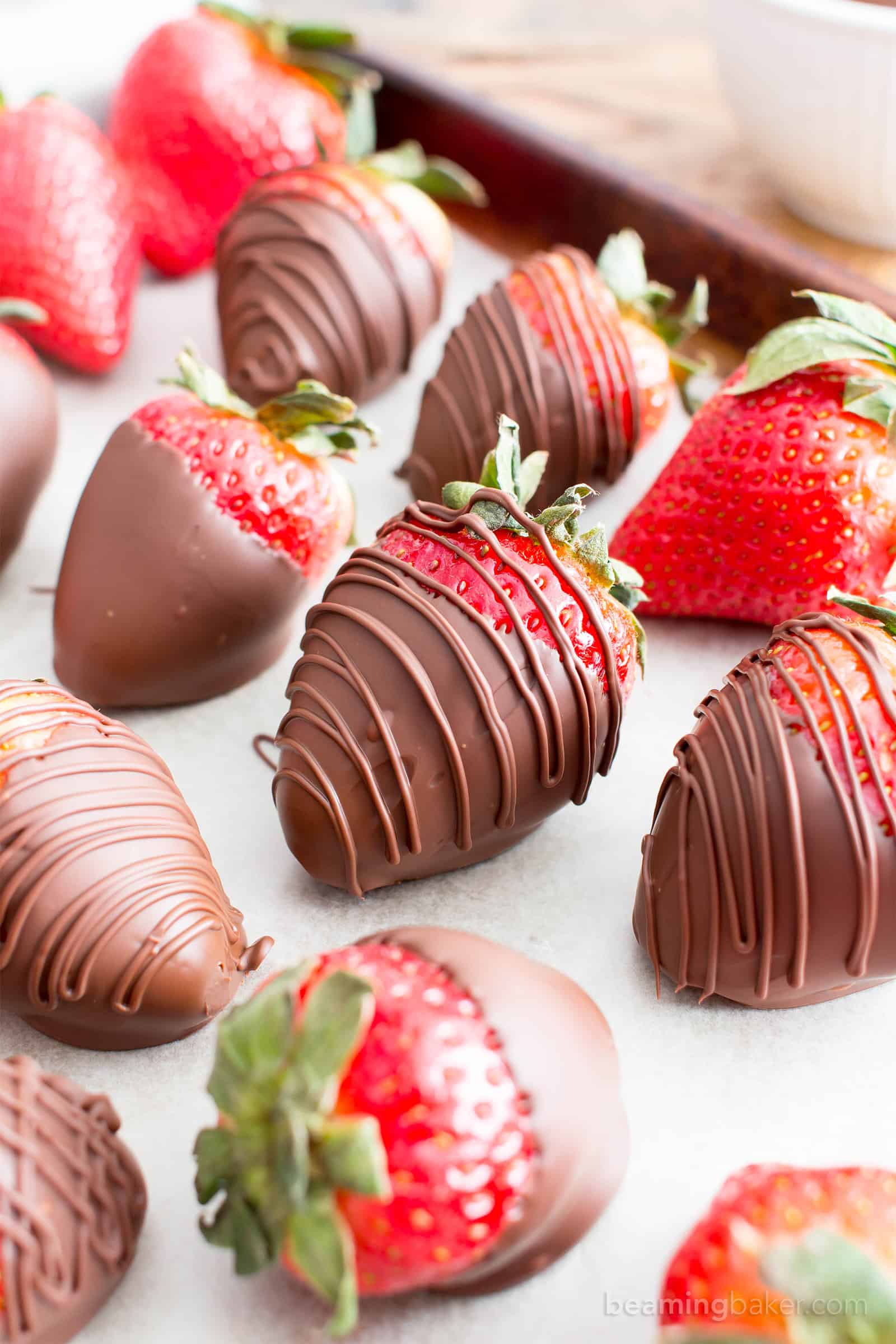 How to Make Chocolate Dipped Strawberries Recipe (V, GF): learn how easy it is to make beautiful, decadently delicious chocolate dipped strawberries! #Vegan #GlutenFree #DairyFree #Paleo #ValentinesDay #Dessert | Recipe on BeamingBaker.com