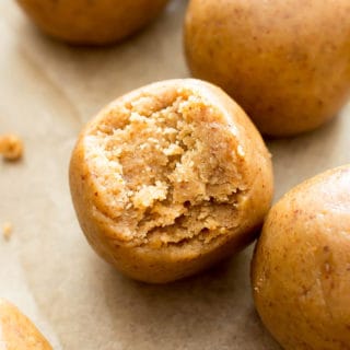 3 Ingredient No Bake Almond Butter Paleo Energy Balls (V, GF, DF): an easy recipe for perfectly sweet, seriously satisfying no bake paleo energy bites. #Vegan #Paleo #GlutenFree #DairyFree #Healthy #Snacks | Recipe on BeamingBaker.com