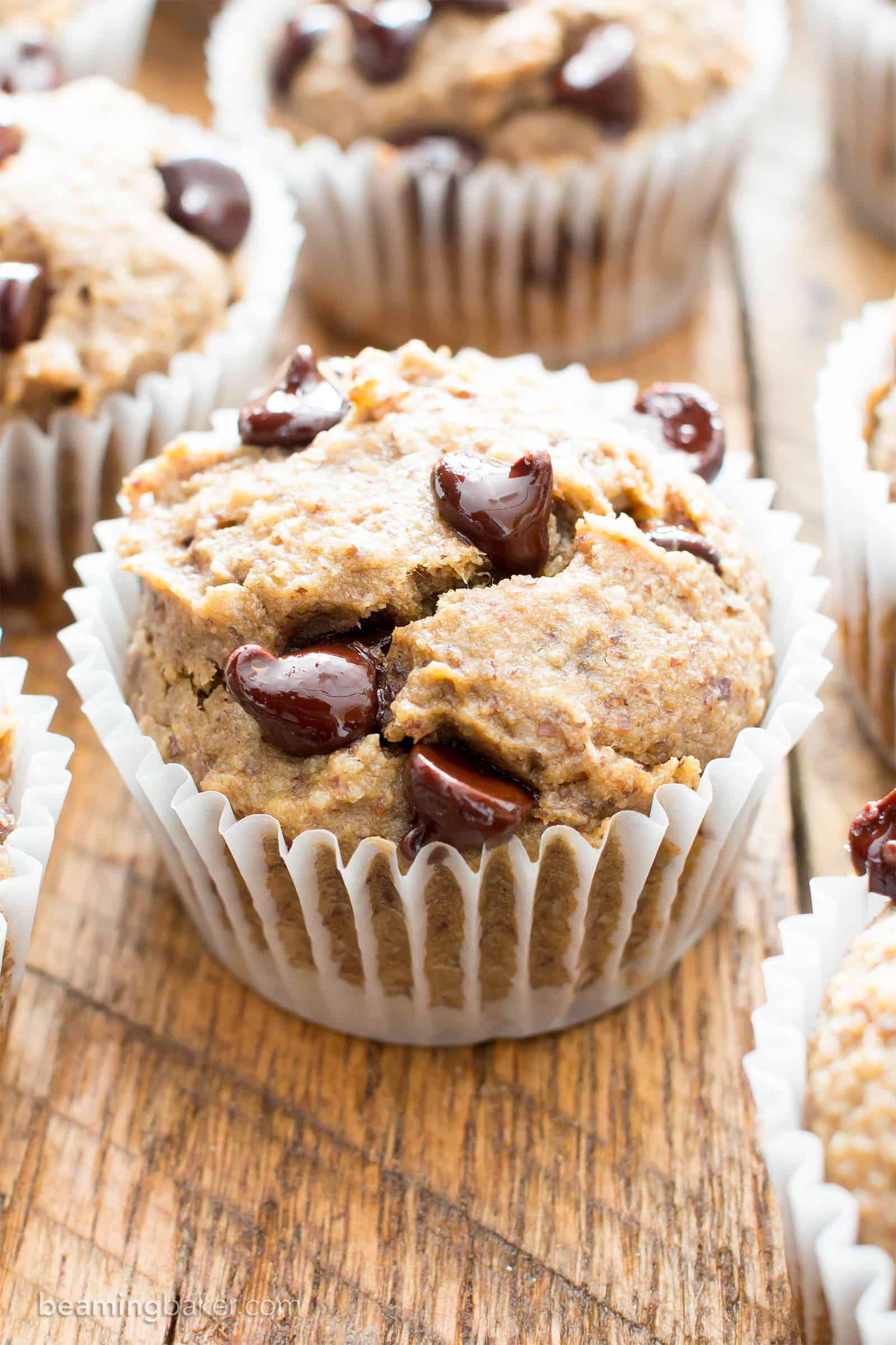 Moist Banana Chocolate Chip Muffins (V, GF): a one bowl recipe for perfectly moist banana muffins bursting with chocolate chips! #Vegan #GlutenFree #DairyFree #Breakfast #Dessert | Recipe on BeamingBaker.com