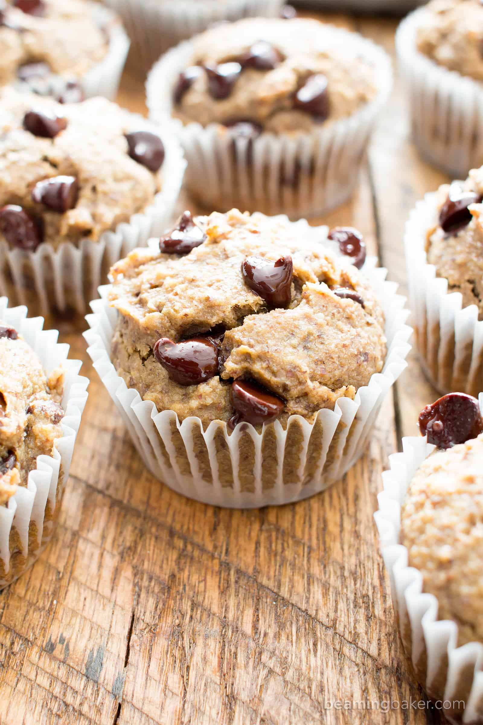 Moist Banana Chocolate Chip Muffins (V, GF): a one bowl recipe for perfectly moist banana muffins bursting with chocolate chips! #Vegan #GlutenFree #DairyFree #Breakfast #Dessert | Recipe on BeamingBaker.com