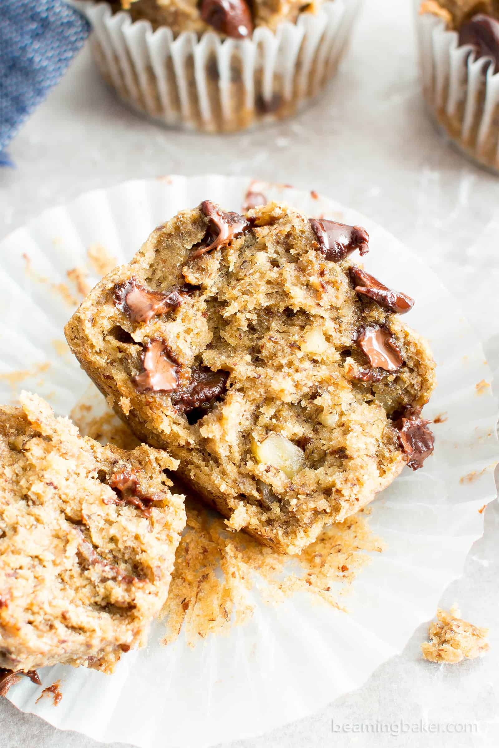 Moist Banana Chocolate Chip Muffins (V, GF): a one bowl recipe for perfectly moist banana muffins bursting with chocolate chips! #Vegan #GlutenFree #DairyFree #Breakfast #Dessert | Recipe on BeamingBaker.com