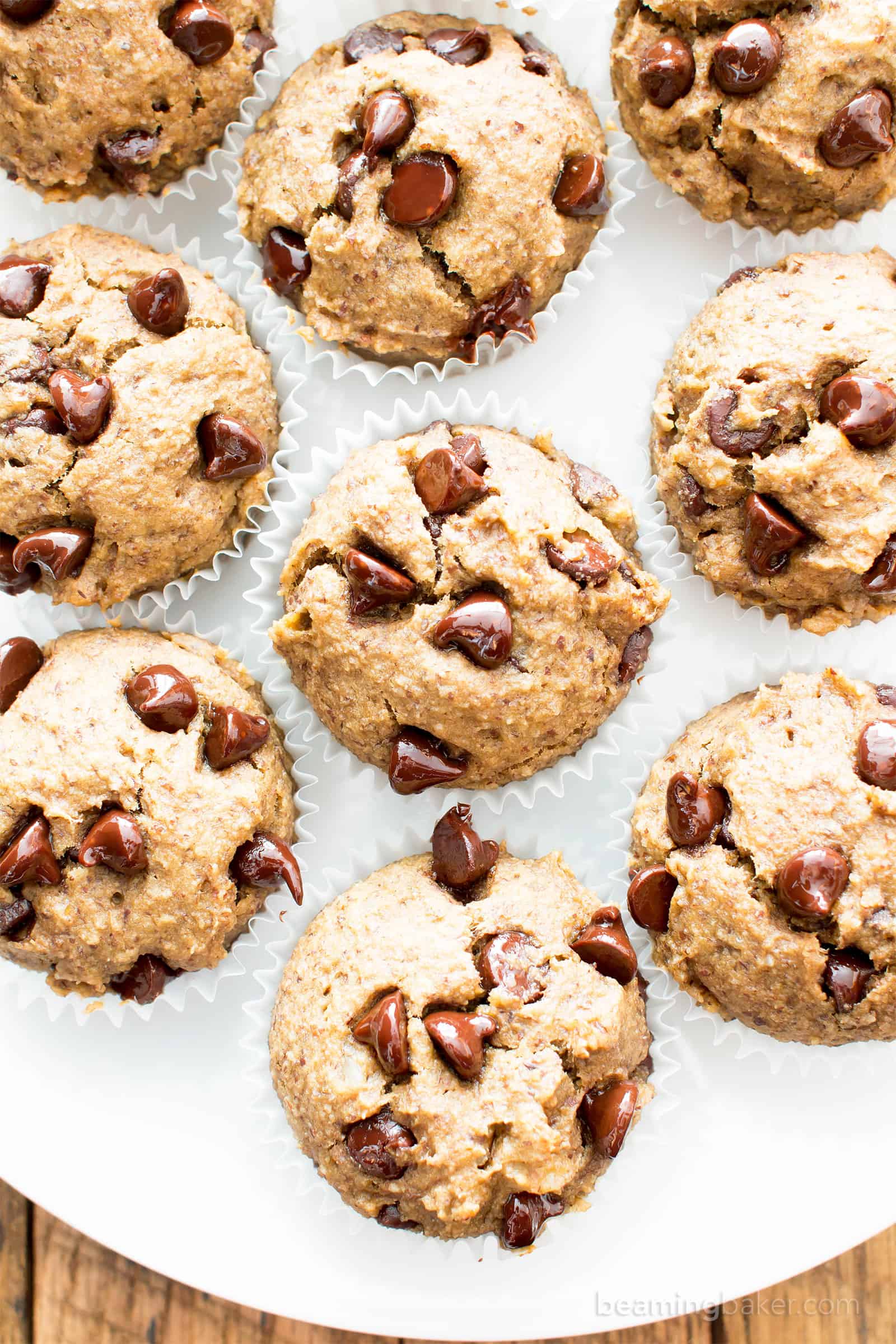 Moist Banana Chocolate Chip Muffins (V, GF): a one bowl recipe for perfectly moist banana muffins bursting with chocolate chips! #Vegan #GlutenFree #DairyFree #Breakfast #Dessert | Recipe on BeamingBaker.com