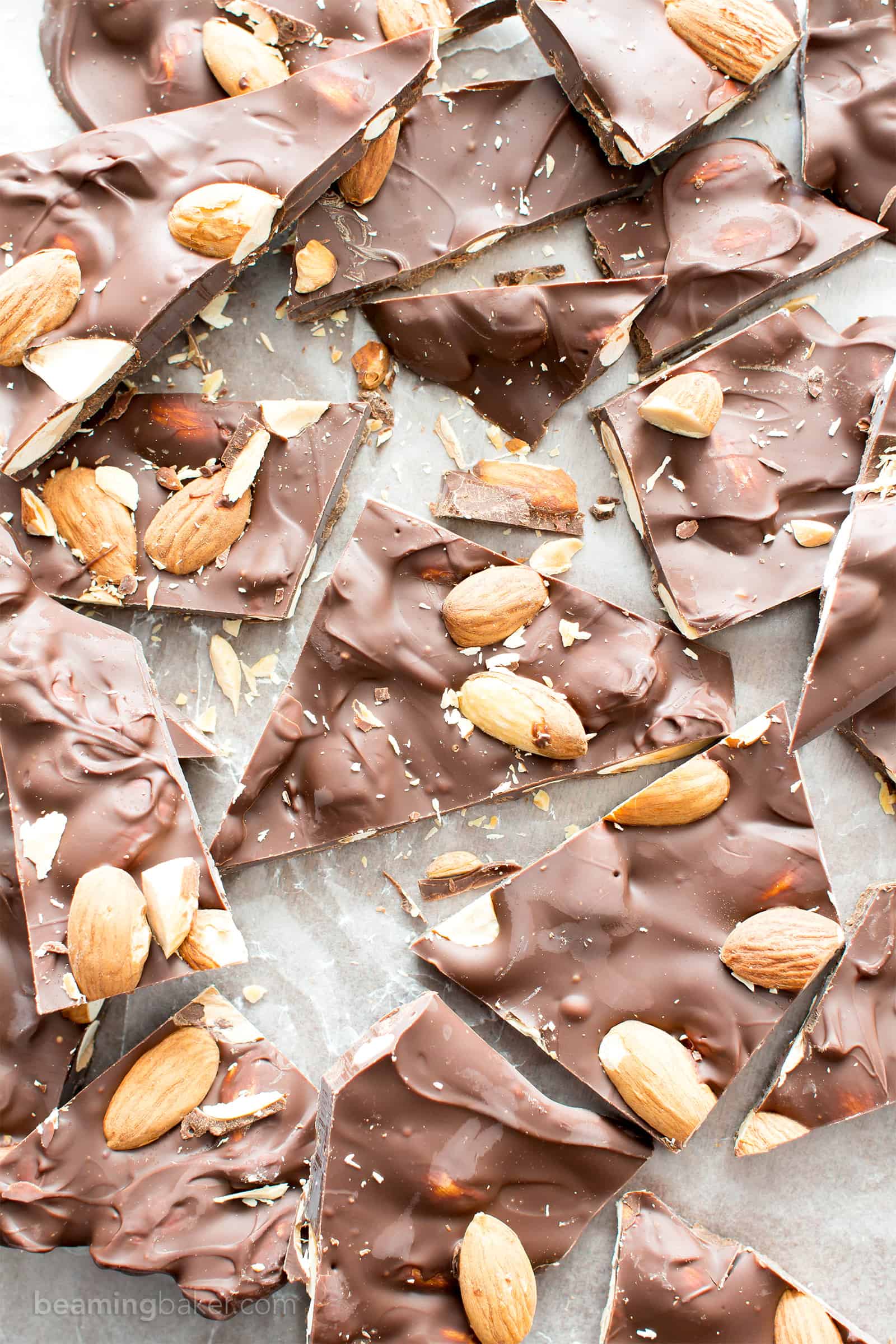 3 Ingredient Chocolate Almond Bark Recipe (V, GF): a fun recipe for thick pieces of indulgent chocolate bark perfectly packed with almonds. #Vegan #Paleo #GlutenFree #DairyFree #Dessert #Candy | Recipe on BeamingBaker.com