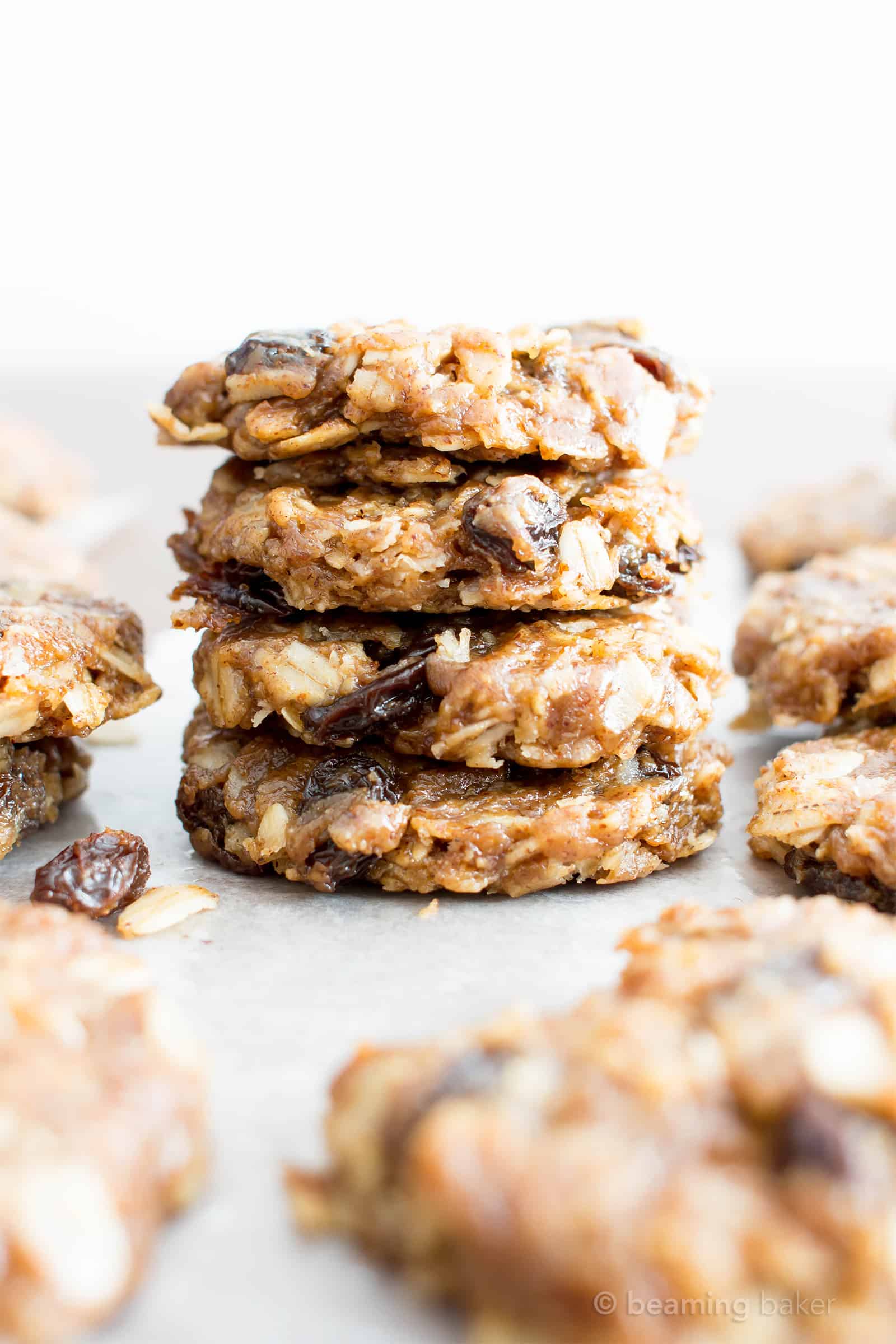 4 Ingredient No Bake Chewy Oatmeal Raisin Cookies (V, GF): an easy recipe for delightfully chewy no bake cookies bursting with raisins and cinnamon flavor! #Vegan #GlutenFree #DairyFree #Cookies #NoBake #Dessert | Recipe on BeamingBaker.com