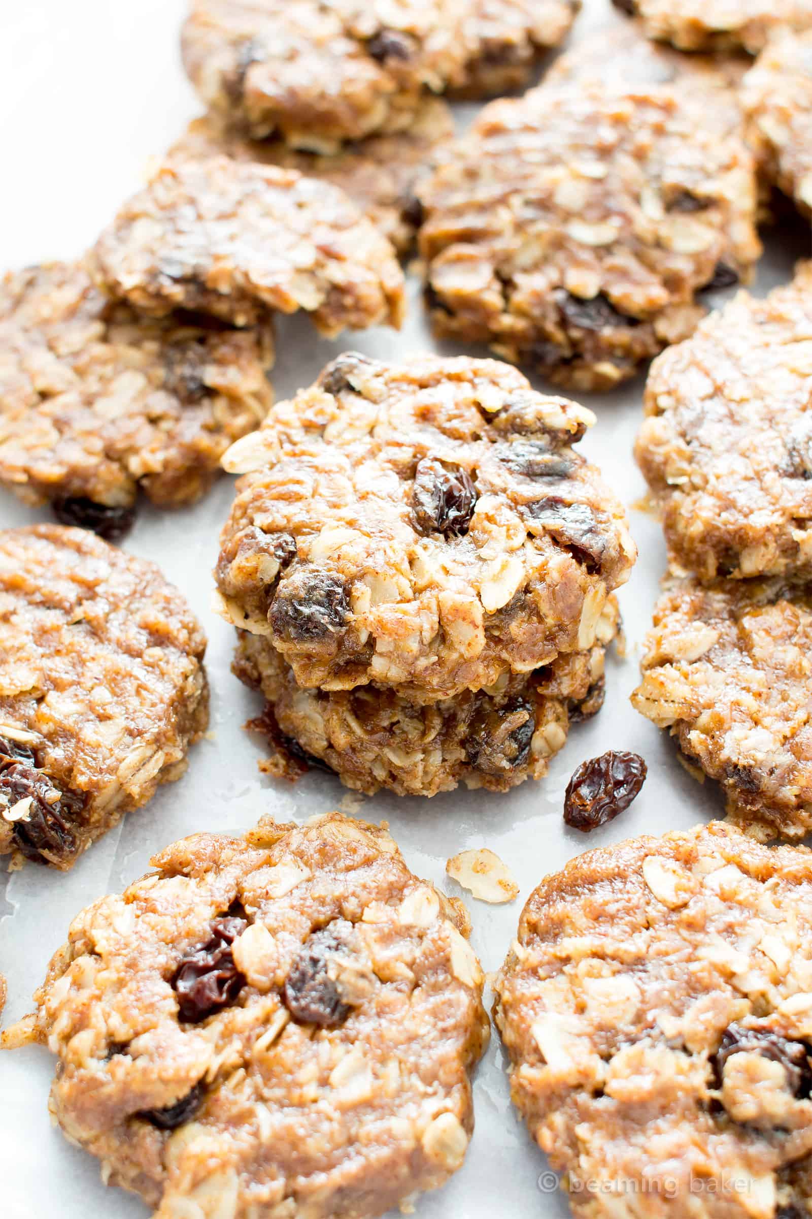 4 Ingredient No Bake Chewy Oatmeal Raisin Cookies (V, GF): an easy recipe for delightfully chewy no bake cookies bursting with raisins and cinnamon flavor! #Vegan #GlutenFree #DairyFree #Cookies #NoBake #Dessert | Recipe on BeamingBaker.com