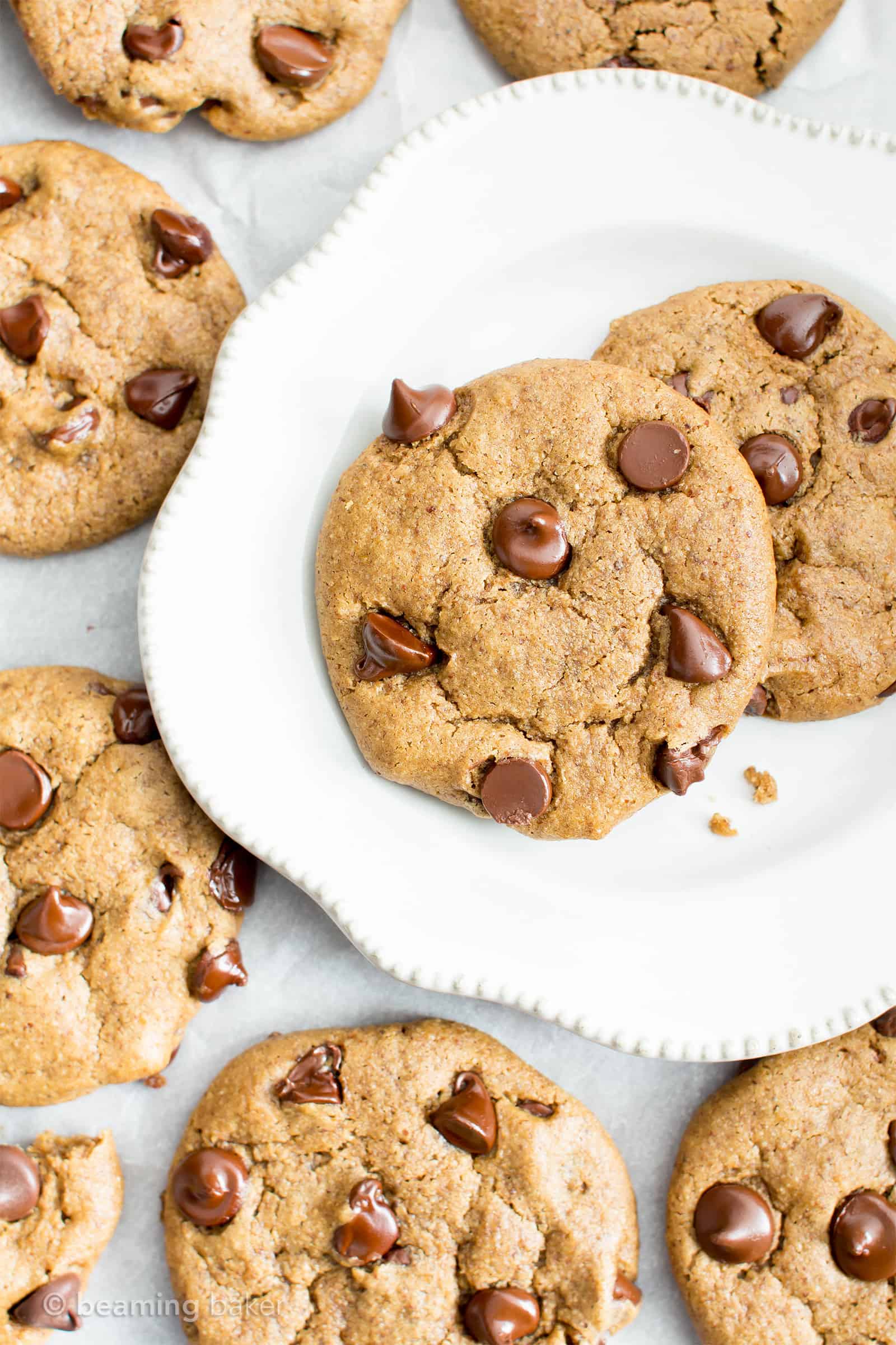 Gluten Free Almond Butter Chocolate Chip Cookies (V, GF): an irresistible recipe for perfectly chewy chocolate chip cookies made with smooth, creamy almond butter and a secret ingredient. #Vegan #GlutenFree #DairyFree #Cookies #Dessert #AD | Recipe on BeamingBaker.com