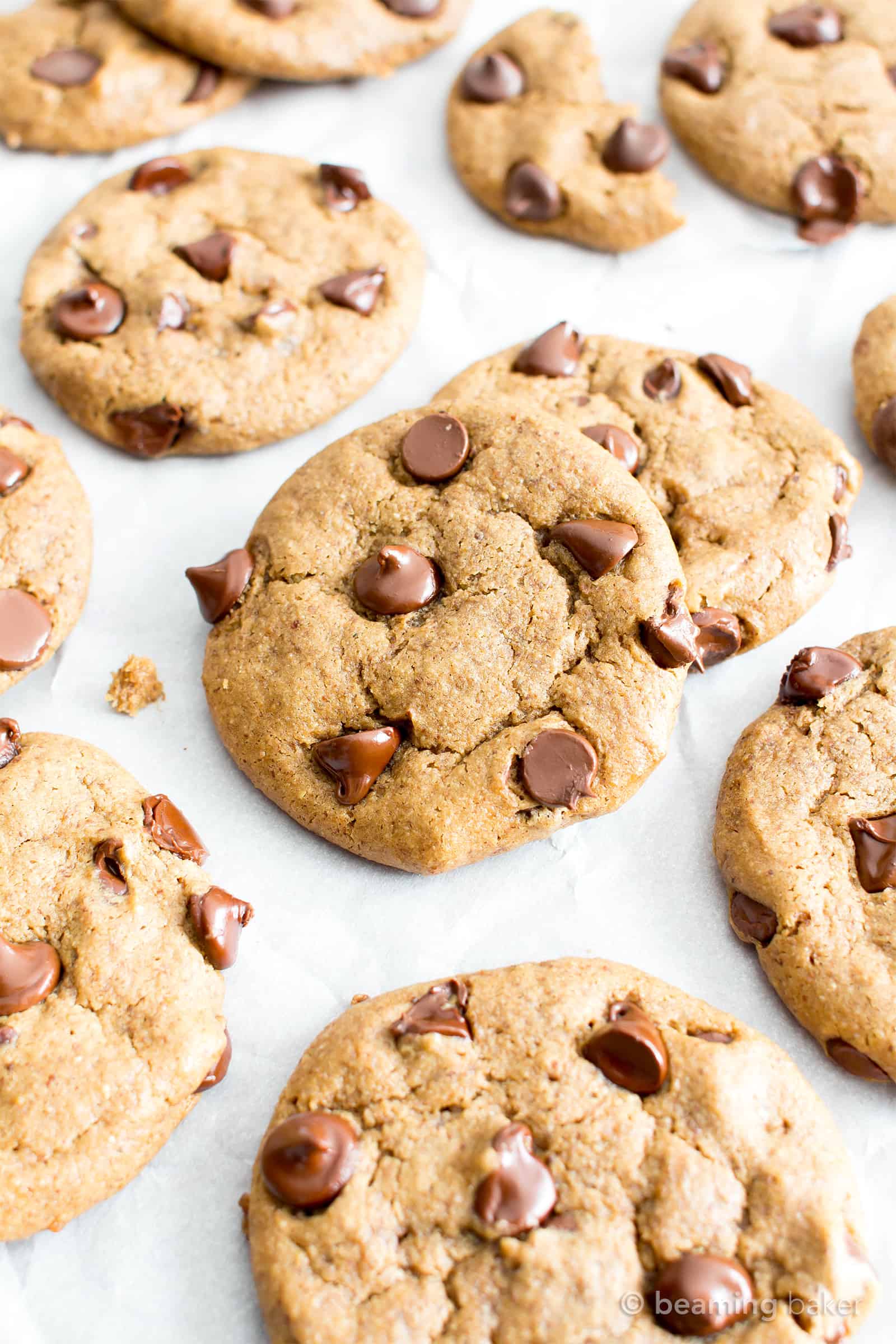 Gluten Free Almond Butter Chocolate Chip Cookies (V, GF): an irresistible recipe for perfectly chewy chocolate chip cookies made with smooth, creamy almond butter and a secret ingredient. #Vegan #GlutenFree #DairyFree #Cookies #Dessert #AD | Recipe on BeamingBaker.com