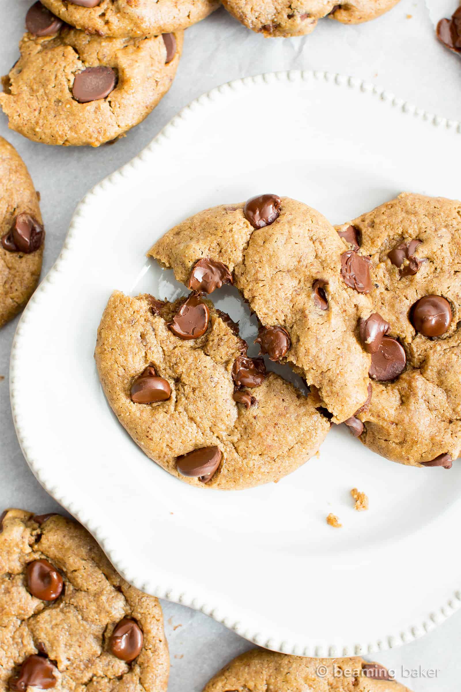 Gluten Free Almond Butter Chocolate Chip Cookies (V, GF): an irresistible recipe for perfectly chewy chocolate chip cookies made with smooth, creamy almond butter and a secret ingredient. #Vegan #GlutenFree #DairyFree #Cookies #Dessert #AD | Recipe on BeamingBaker.com