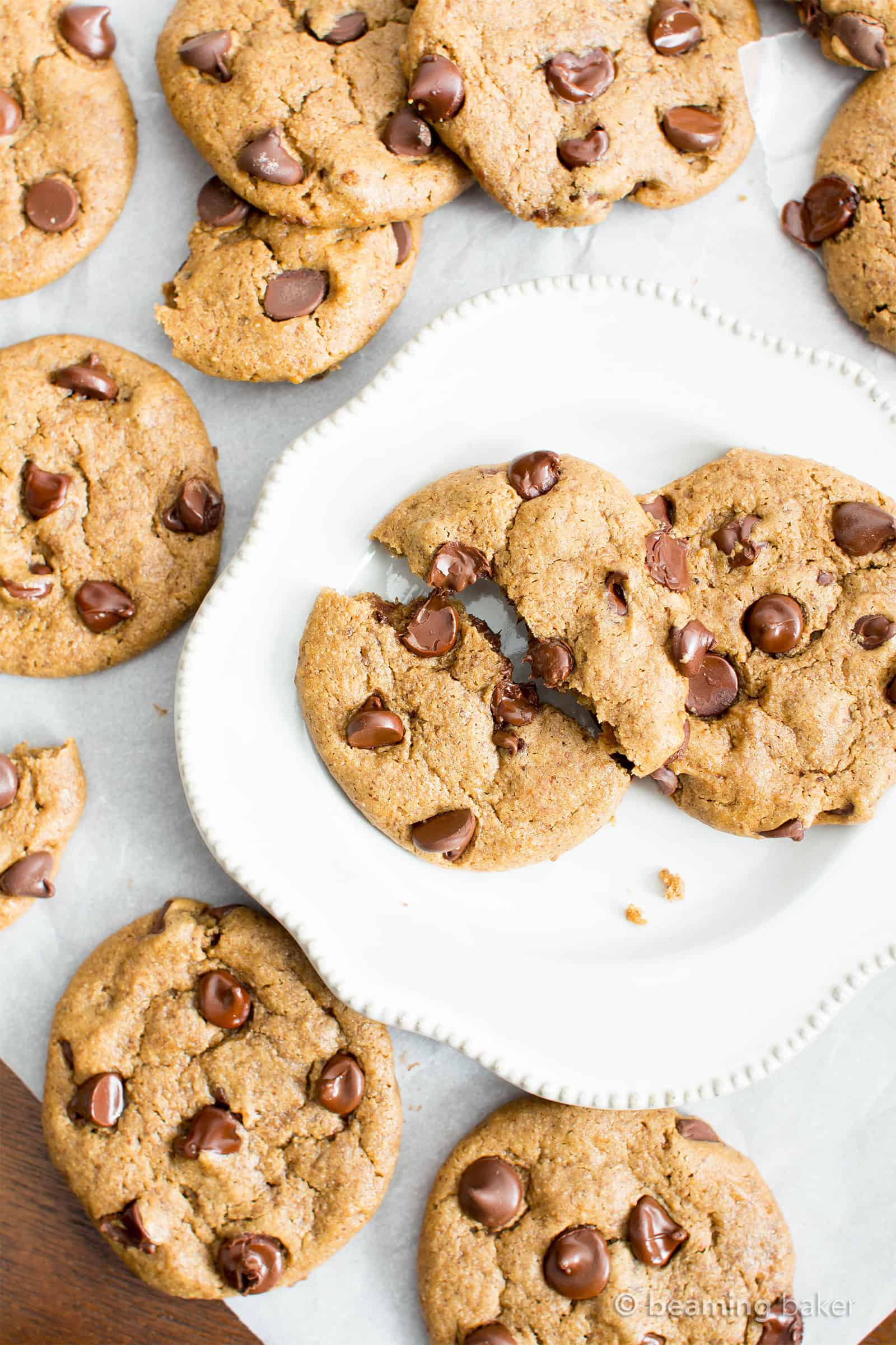 Gluten Free Almond Butter Chocolate Chip Cookies (V, GF): an irresistible recipe for perfectly chewy chocolate chip cookies made with smooth, creamy almond butter and a secret ingredient. #Vegan #GlutenFree #DairyFree #Cookies #Dessert #AD | Recipe on BeamingBaker.com