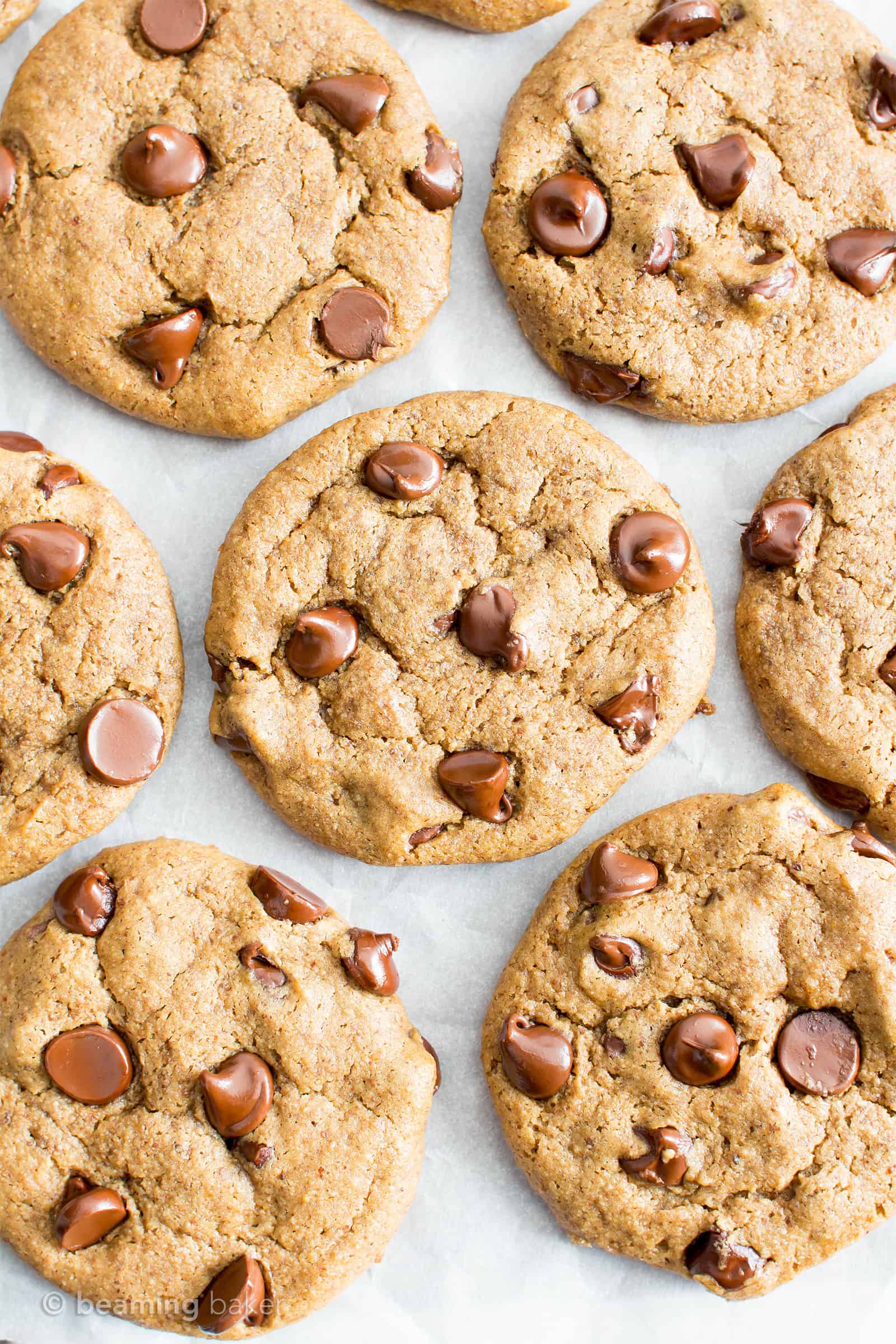 Gluten Free Almond Butter Chocolate Chip Cookies (V, GF): an irresistible recipe for perfectly chewy chocolate chip cookies made with smooth, creamy almond butter and a secret ingredient. #Vegan #GlutenFree #DairyFree #Cookies #Dessert #AD | Recipe on BeamingBaker.com