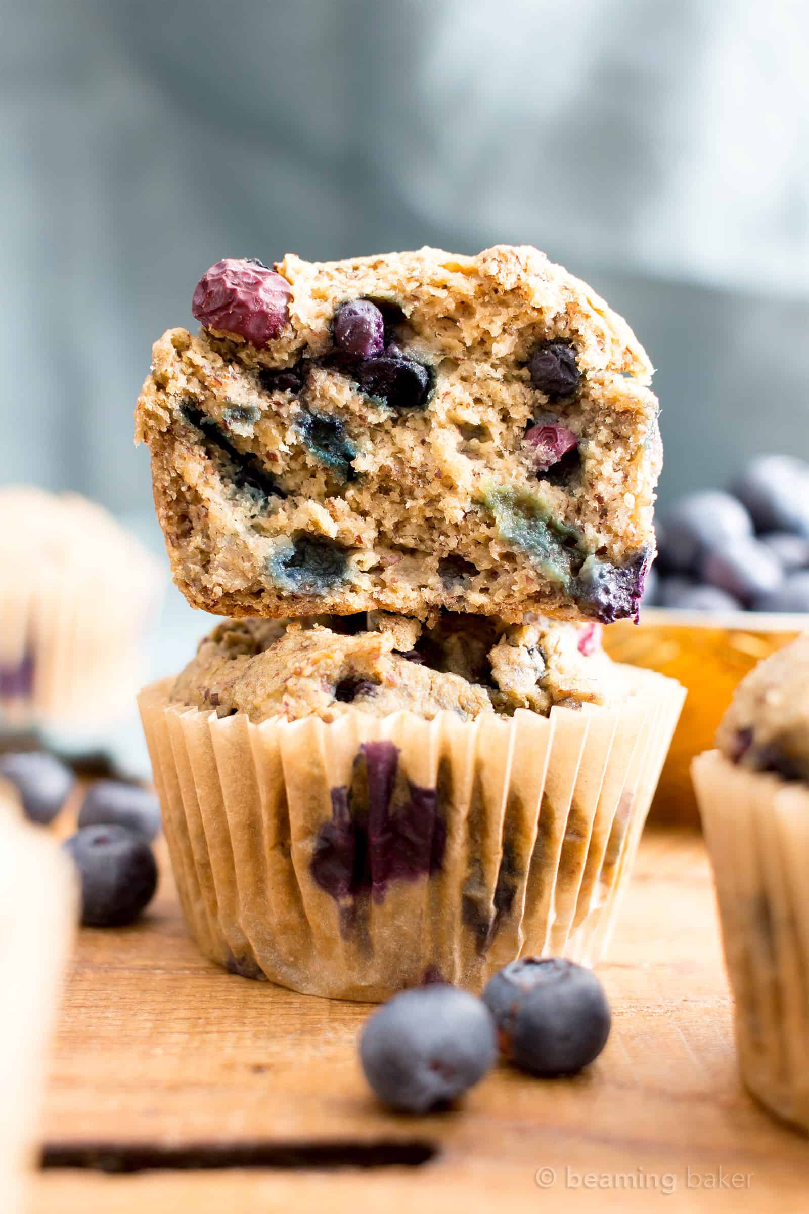 Healthy Banana Blueberry Muffins Recipe (V, GF): an easy recipe for moist banana muffins bursting with fresh blueberry flavor! #Vegan #GlutenFree #DairyFree #Breakfast #Healthy | Recipe on BeamingBaker.com