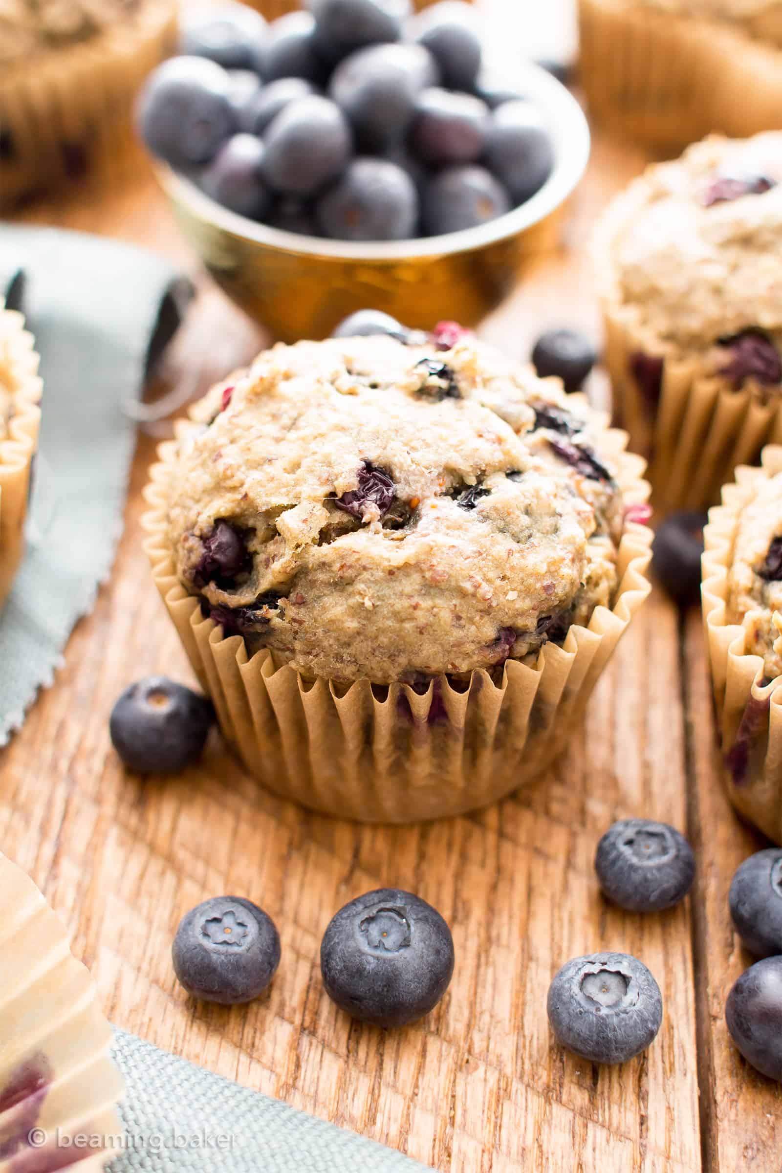 Healthy Banana Blueberry Muffins Recipe (V, GF): an easy recipe for moist banana muffins bursting with fresh blueberry flavor! #Vegan #GlutenFree #DairyFree #Breakfast #Healthy | Recipe on BeamingBaker.com