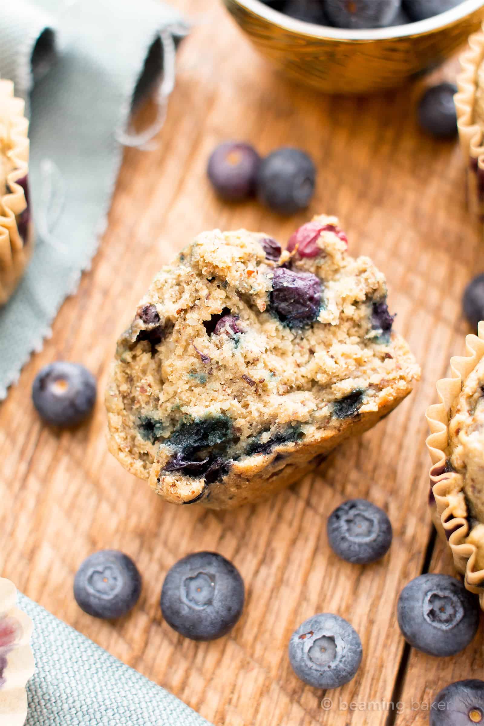 Healthy Banana Blueberry Muffins Recipe (V, GF): an easy recipe for moist banana muffins bursting with fresh blueberry flavor! #Vegan #GlutenFree #DairyFree #Breakfast #Healthy | Recipe on BeamingBaker.com