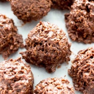 2 Ingredient Chocolate Coconut Candy Clusters: just 5 mins of prep for easy coconut chocolate clusters packed with chewy coconut flakes. The easiest chocolate coconut candy clusters! #Coconut #Chocolate #Candy #Clusters | Recipe at BeamingBaker.com