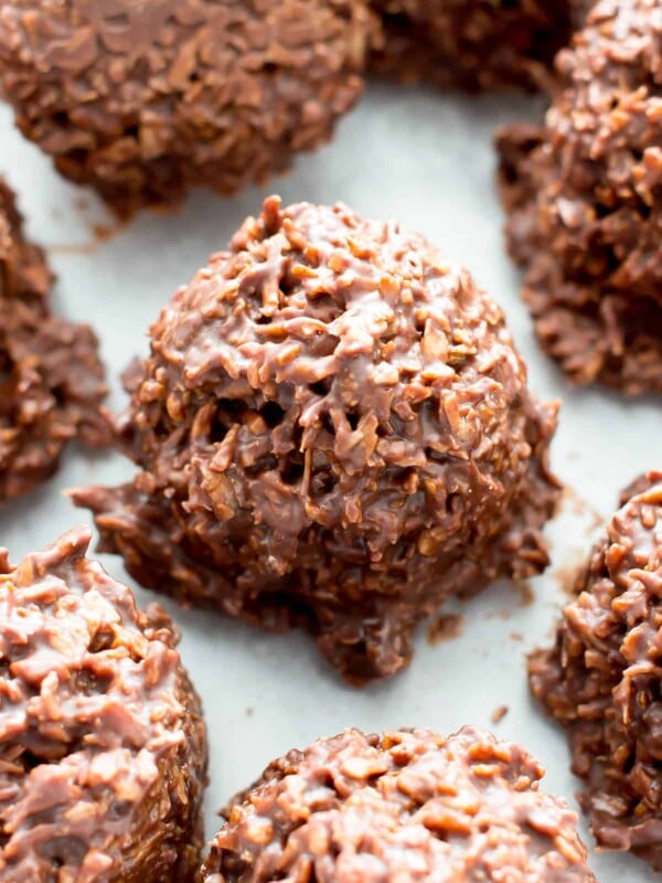 2 Ingredient Chocolate Coconut Candy Clusters: just 5 mins of prep for easy coconut chocolate clusters packed with chewy coconut flakes. The easiest chocolate coconut candy clusters! #Coconut #Chocolate #Candy #Clusters | Recipe at BeamingBaker.com