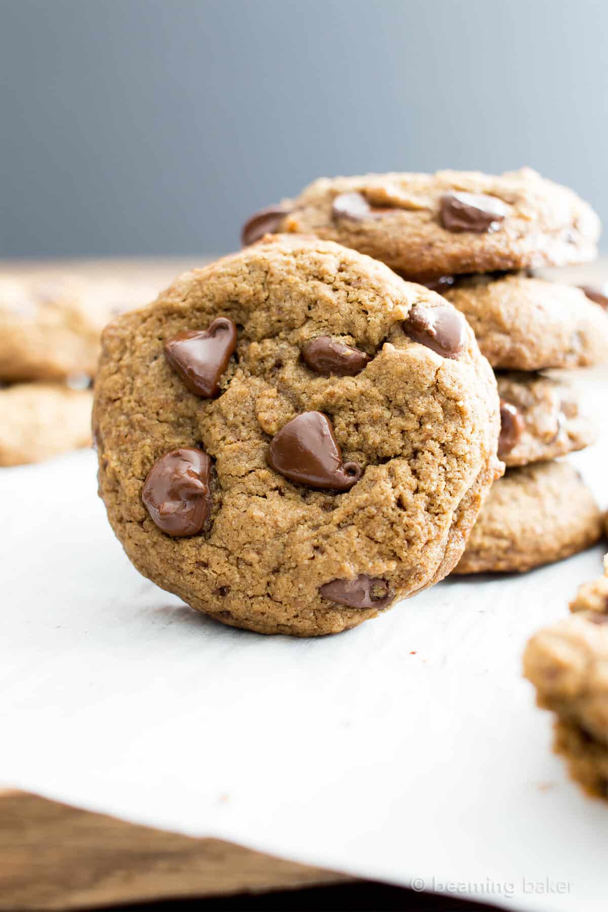 Vegan Chocolate Chip Cookies Recipe (V, GF): Chewy on the inside, crispy on the edges, and packed with rich chocolate. My favorite chocolate chip cookies! #Vegan #GlutenFree #DairyFree #Cookies #Dessert | Recipe on BeamingBaker.com